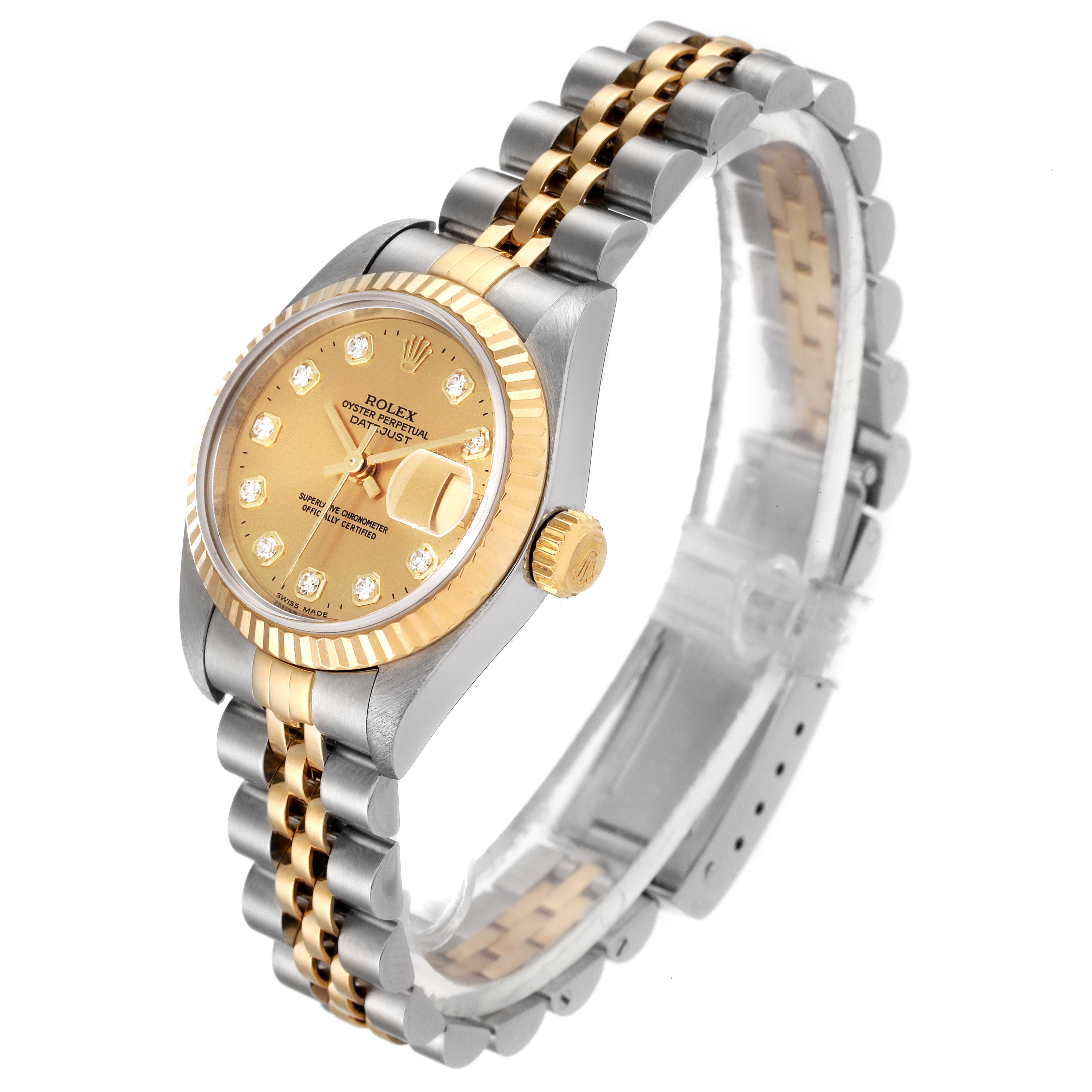 The image shows a Rolex Datejust 79173 Women's Steel and Gold (two tone) Champagne Dial 79173 Women's Steel and Gold (two tone) Champagne Dial watch from an angled top view, highlighting its dial, bezel, and bracelet.