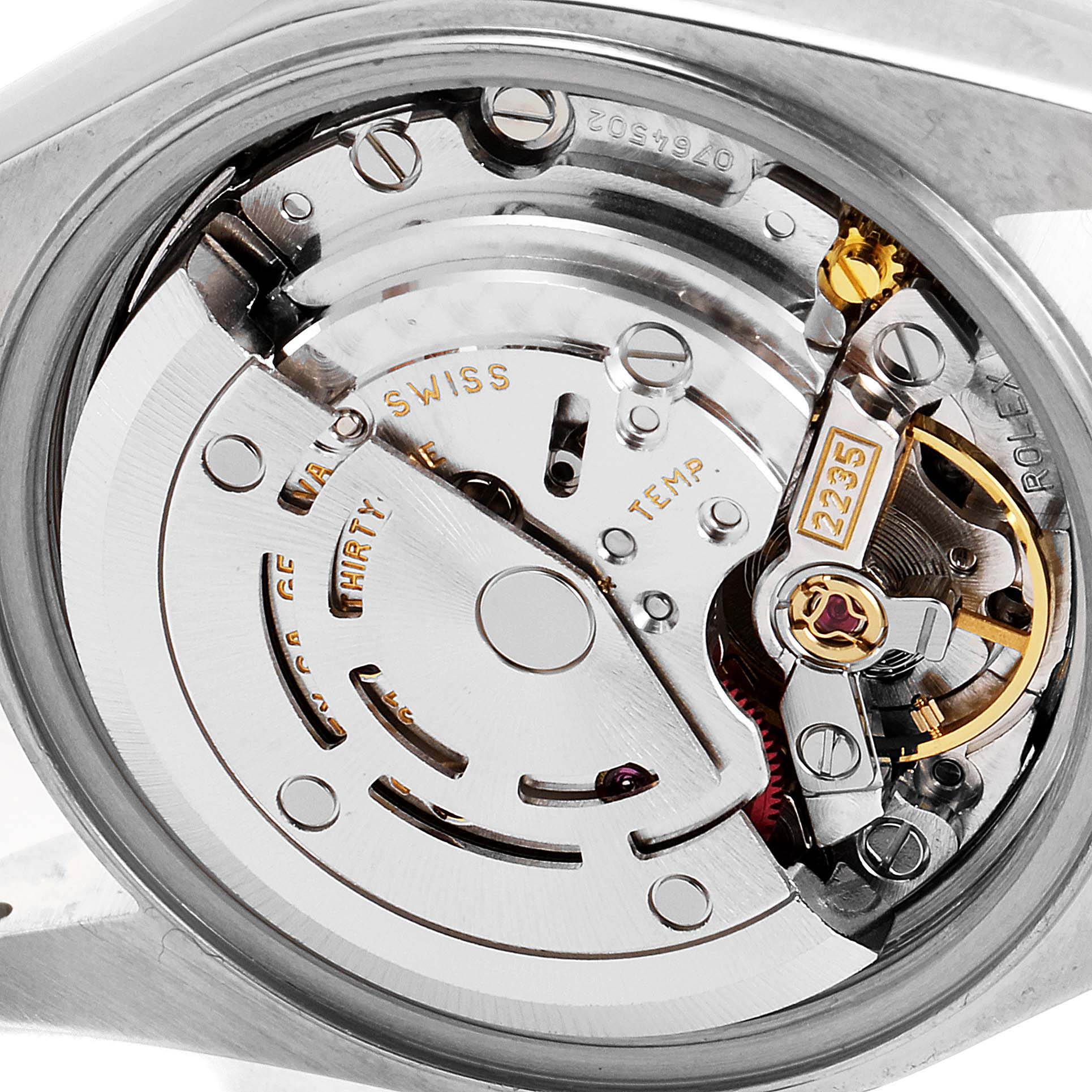 This image shows a close-up view of the movement mechanism of a Rolex Datejust 79173 Women's Steel and Gold (two tone) Silver Dial 79173 Women's Steel and Gold (two tone) Silver Dial watch.