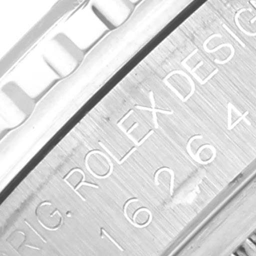 The image shows a close-up view of the side engraving on a Rolex Turn-o-Graph 16264 Men
s Stainless Steel Silver Dial 16264 Men
s Stainless Steel Silver Dial watch case.