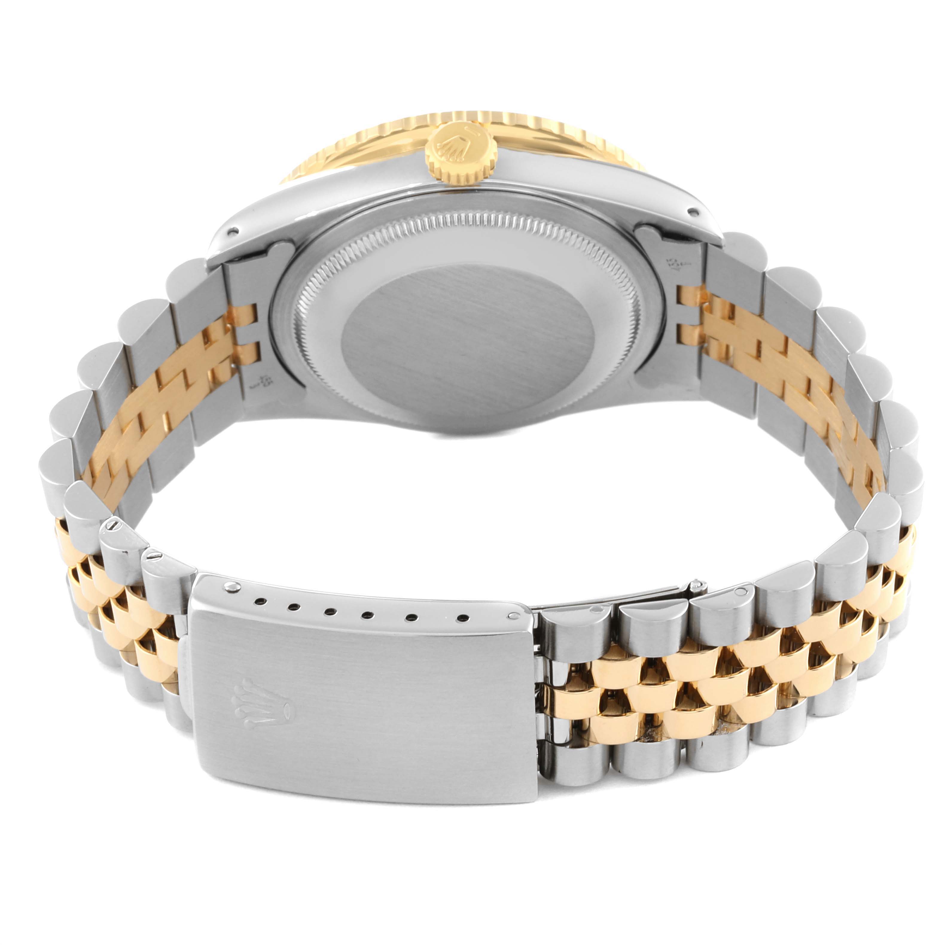 This image shows the Rolex Turn-o-Graph 16263 Men
s Steel and Gold (two tone) Champagne Dial 16263 Men
s Steel and Gold (two tone) Champagne Dial watch from a rear angle, highlighting the case back, crown, and two-tone bracelet with clasp.