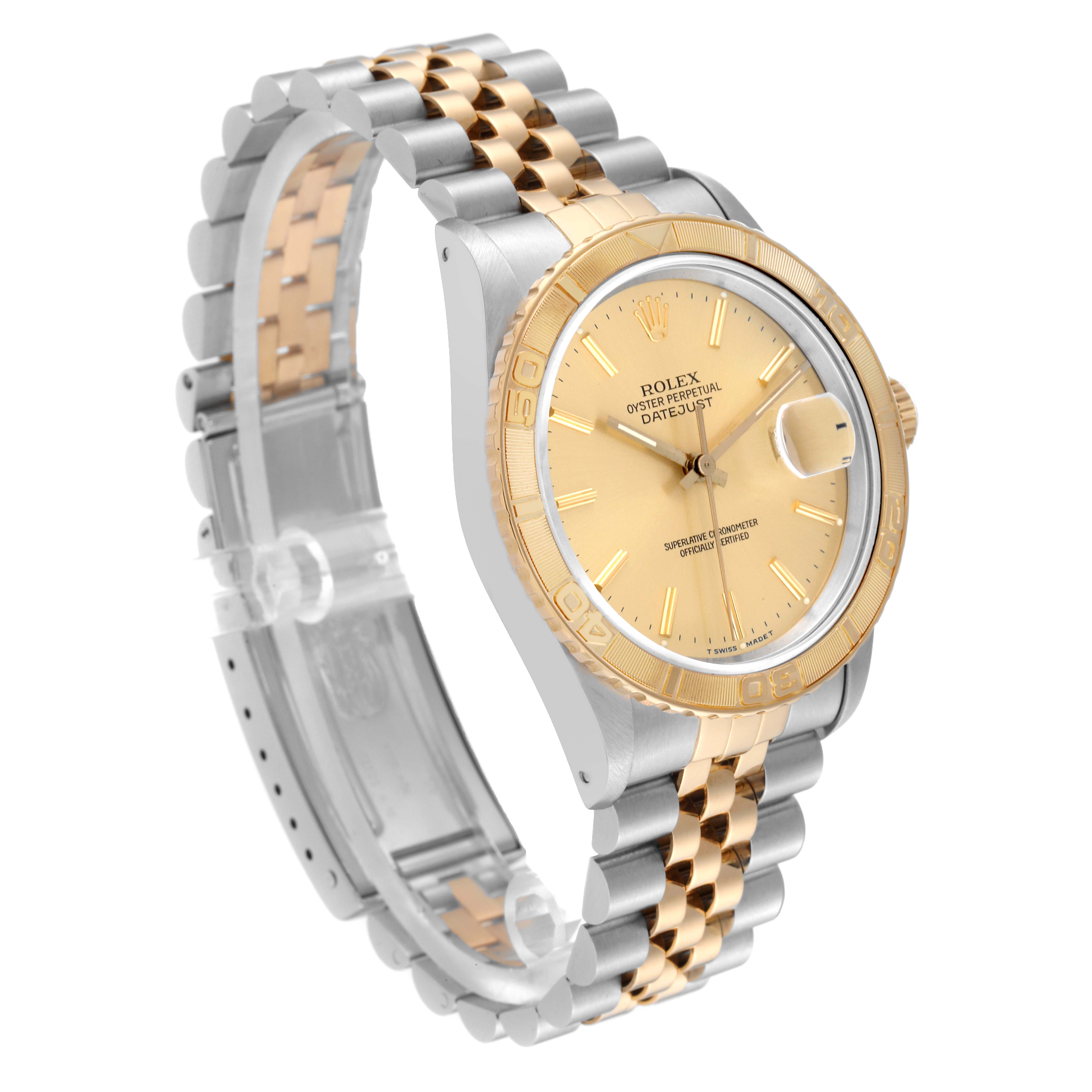 This Rolex Turn-o-Graph 16263 Men
s Steel and Gold (two tone) Champagne Dial 16263 Men
s Steel and Gold (two tone) Champagne Dial watch is angled to show its gold and silver two-tone bracelet, bezel, and face with date display.