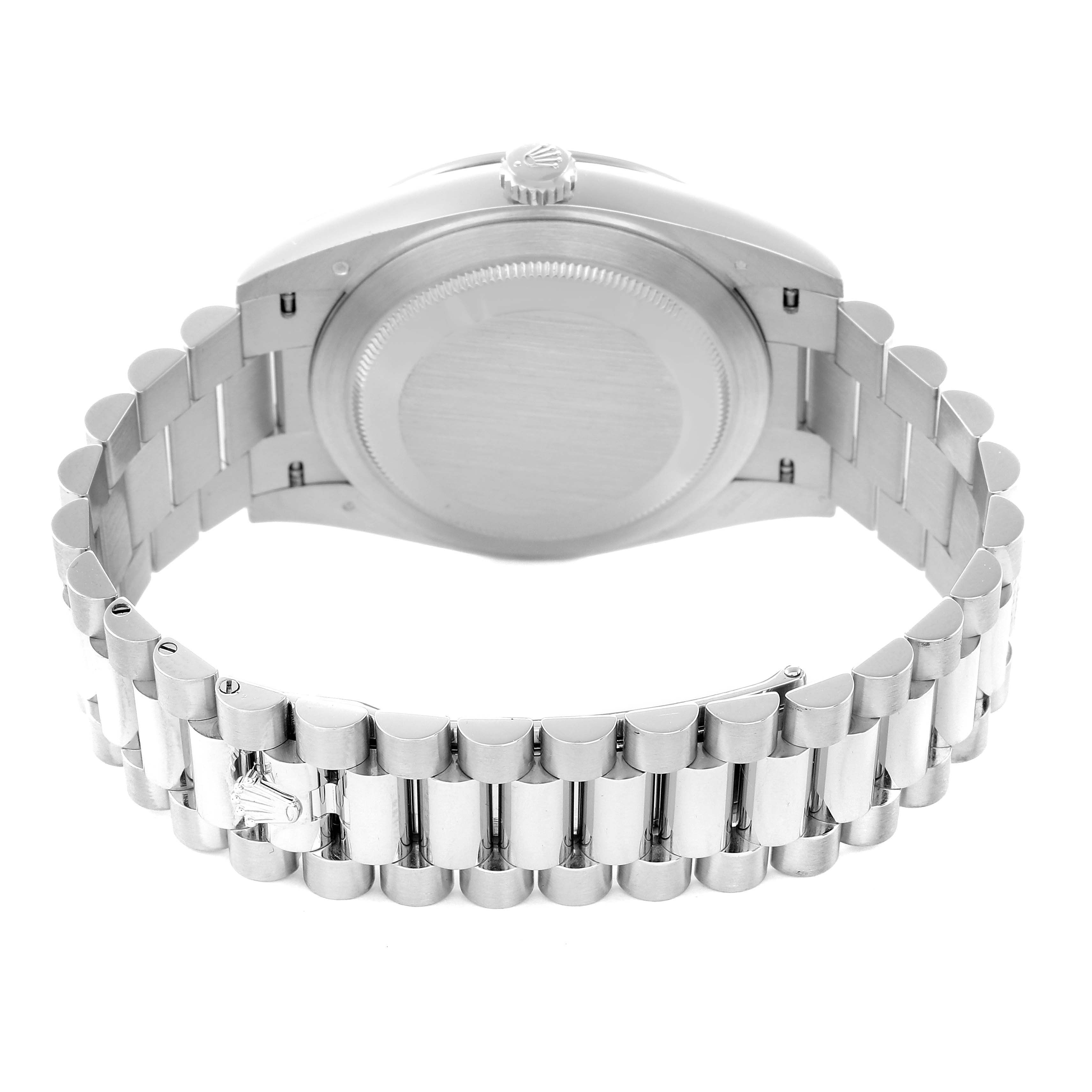 The image shows the back view of a Rolex President 228396 Men
s Platinum Silver Dial watch, highlighting the case back and bracelet links.