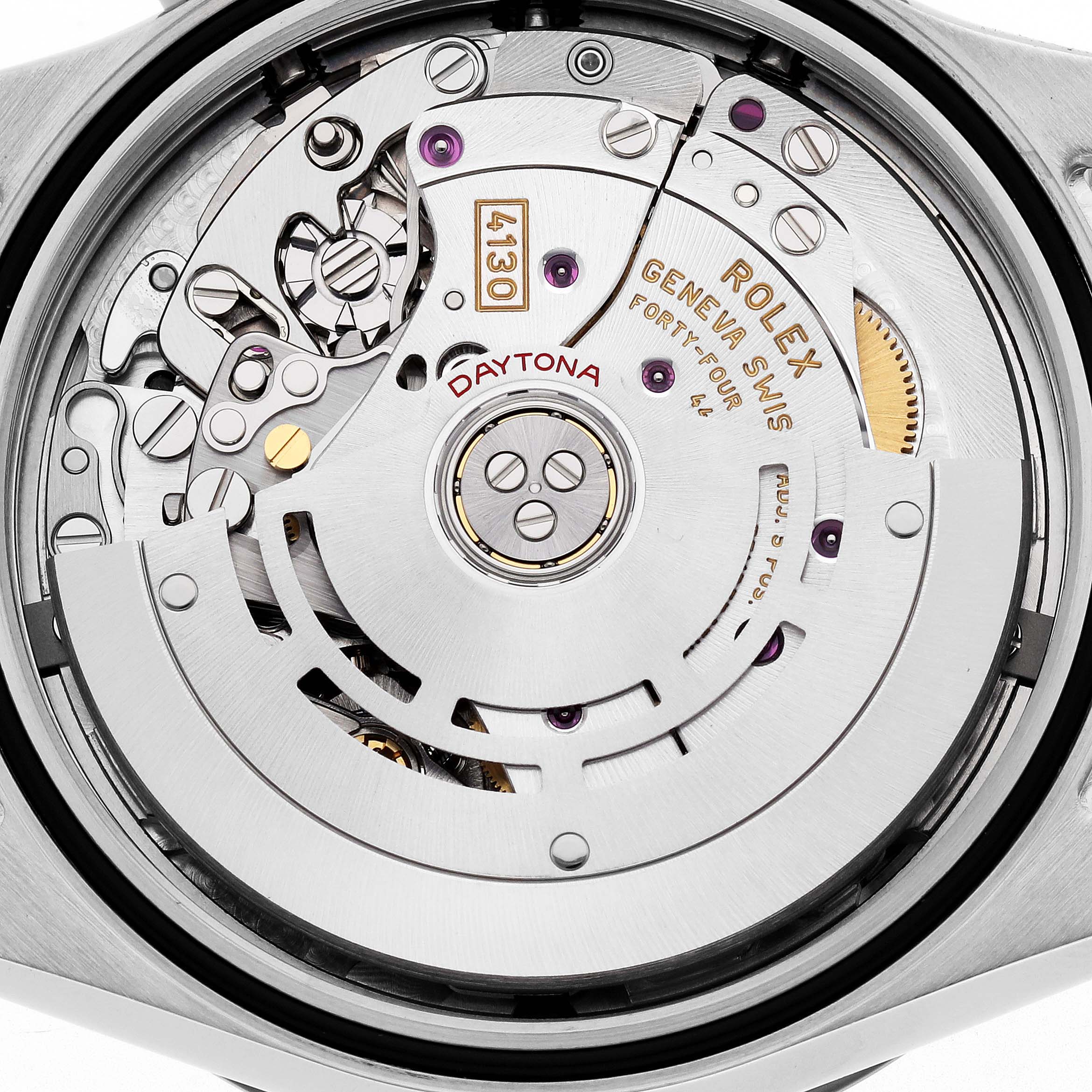 The image shows the movement of a Rolex Daytona 116500 Men
s Stainless Steel White Dial watch, viewed from the back, highlighting its intricate mechanisms.