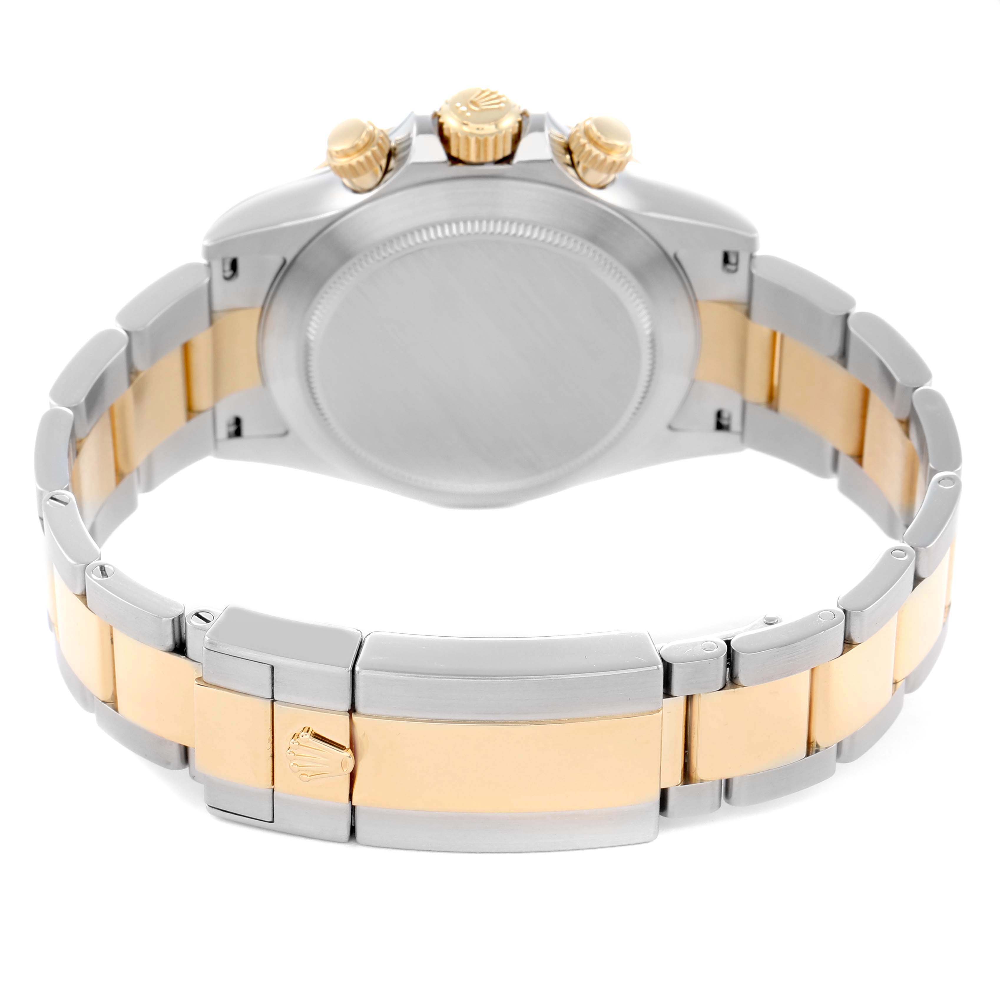 The image shows the back of a Rolex Daytona 116503 Men
s Steel and Gold (two tone) Mother of Pearl Dial watch, highlighting the bracelet, clasp, and case back.