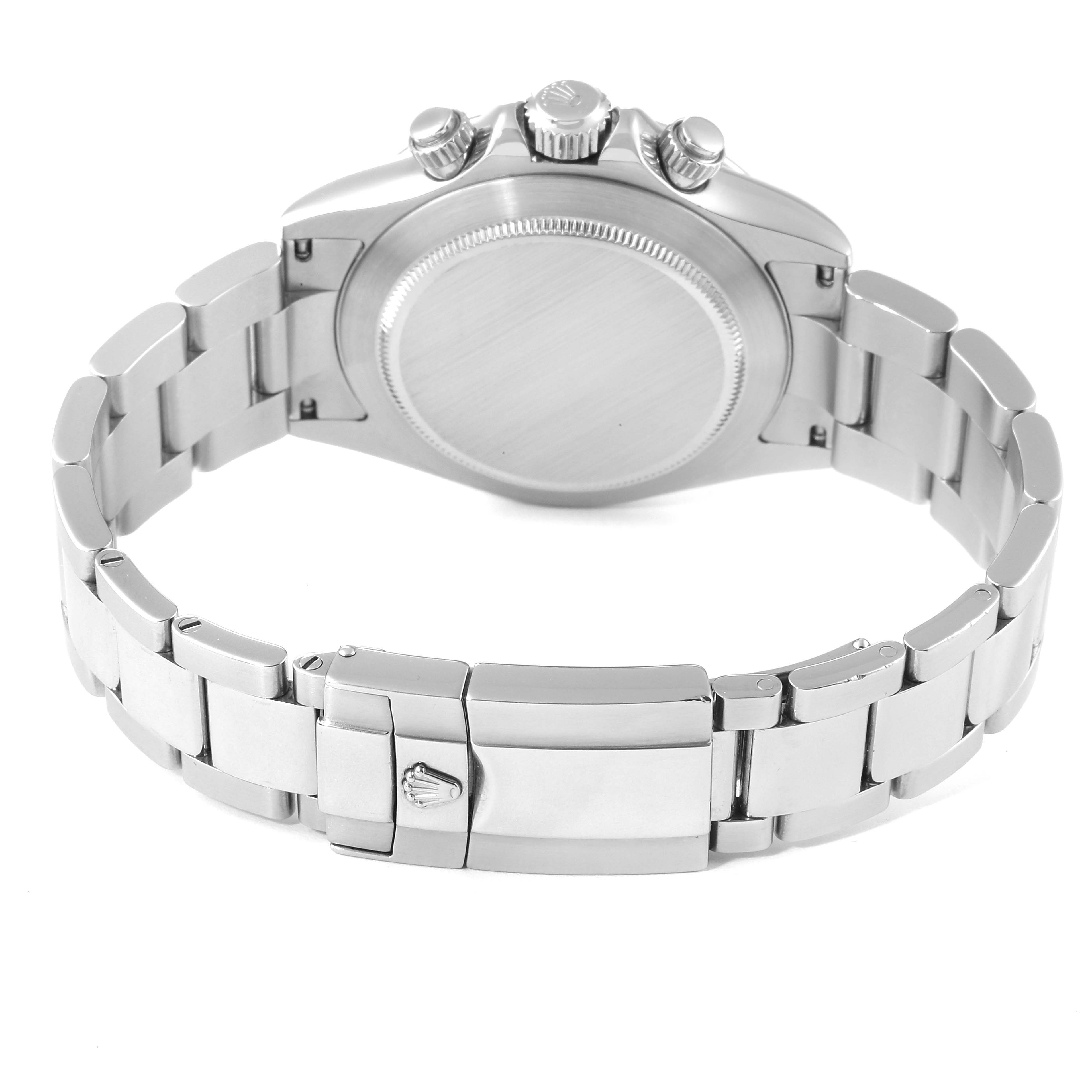 The Rolex Daytona 116520 Men's Stainless Steel White Dial 116520 Men's Stainless Steel White Dial watch is shown from the back, displaying the case back, crown, pushers, and metal bracelet with clasp.