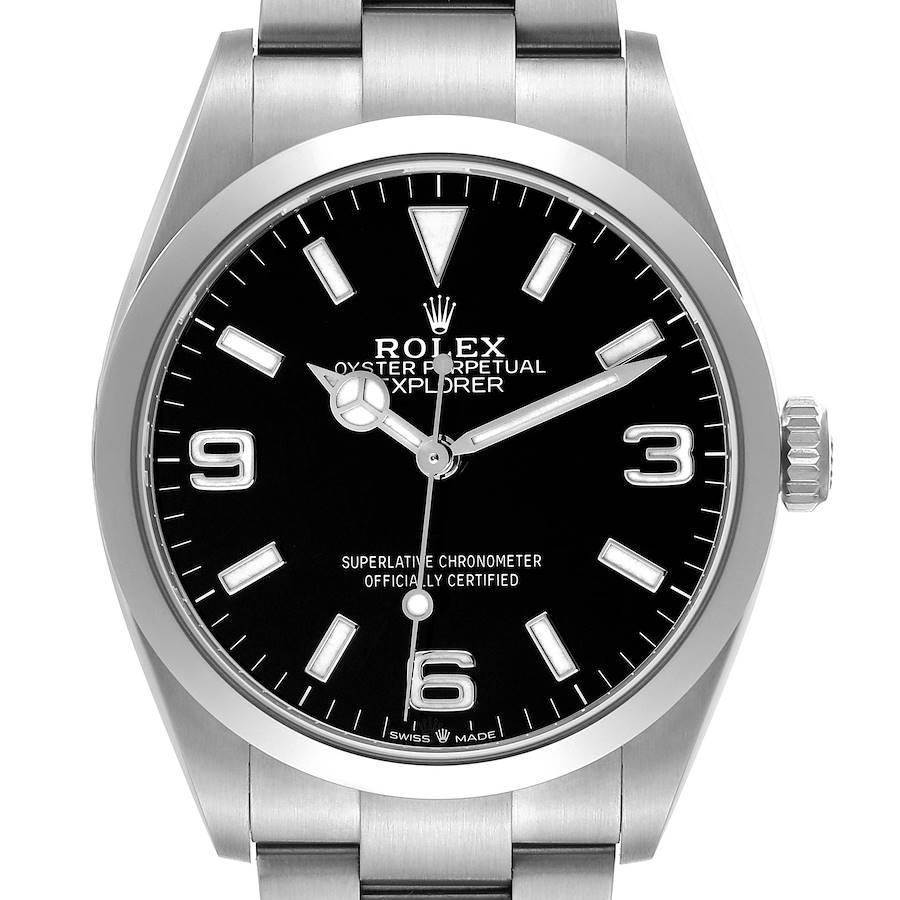 The Rolex Explorer 124270 Men's Stainless Steel Black Dial watch is shown from a front angle, displaying its black dial, luminous markers, hands, and stainless steel bracelet.