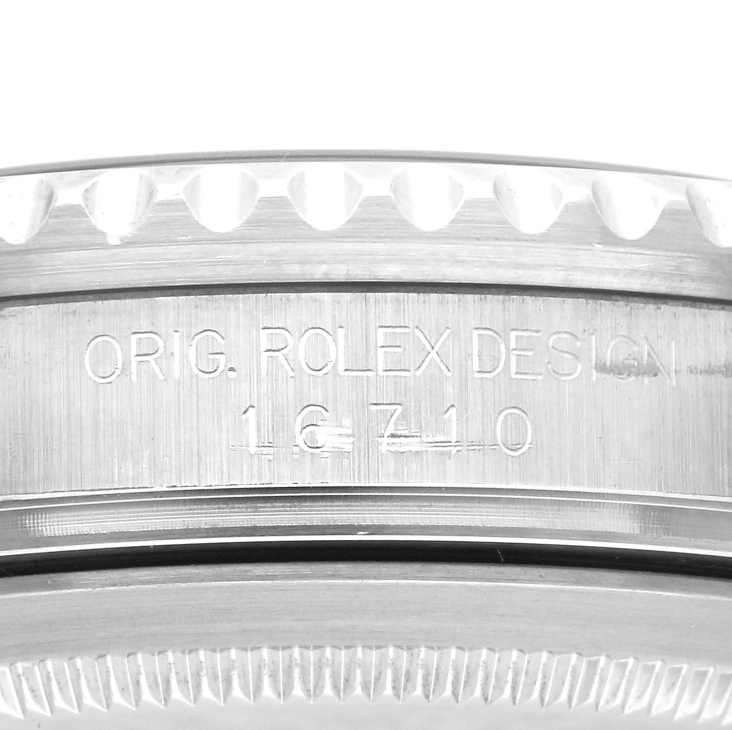 This image shows a close-up view of the model number engraving on the side of a Rolex GMT-Master 16710 Men
s Stainless Steel Black Dial 16710 Men
s Stainless Steel Black Dial watch case.