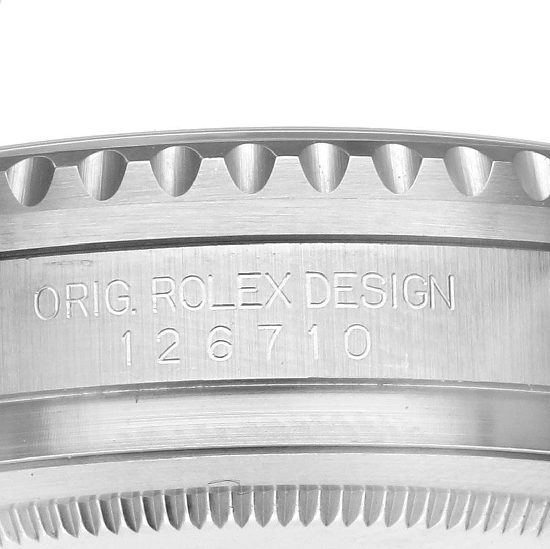 This image shows a close-up of the side of the bezel and case of a Rolex GMT-Master 126710BLRO Men's Stainless Steel Black Dial 126710BLRO Men's Stainless Steel Black Dial, model number 126710.