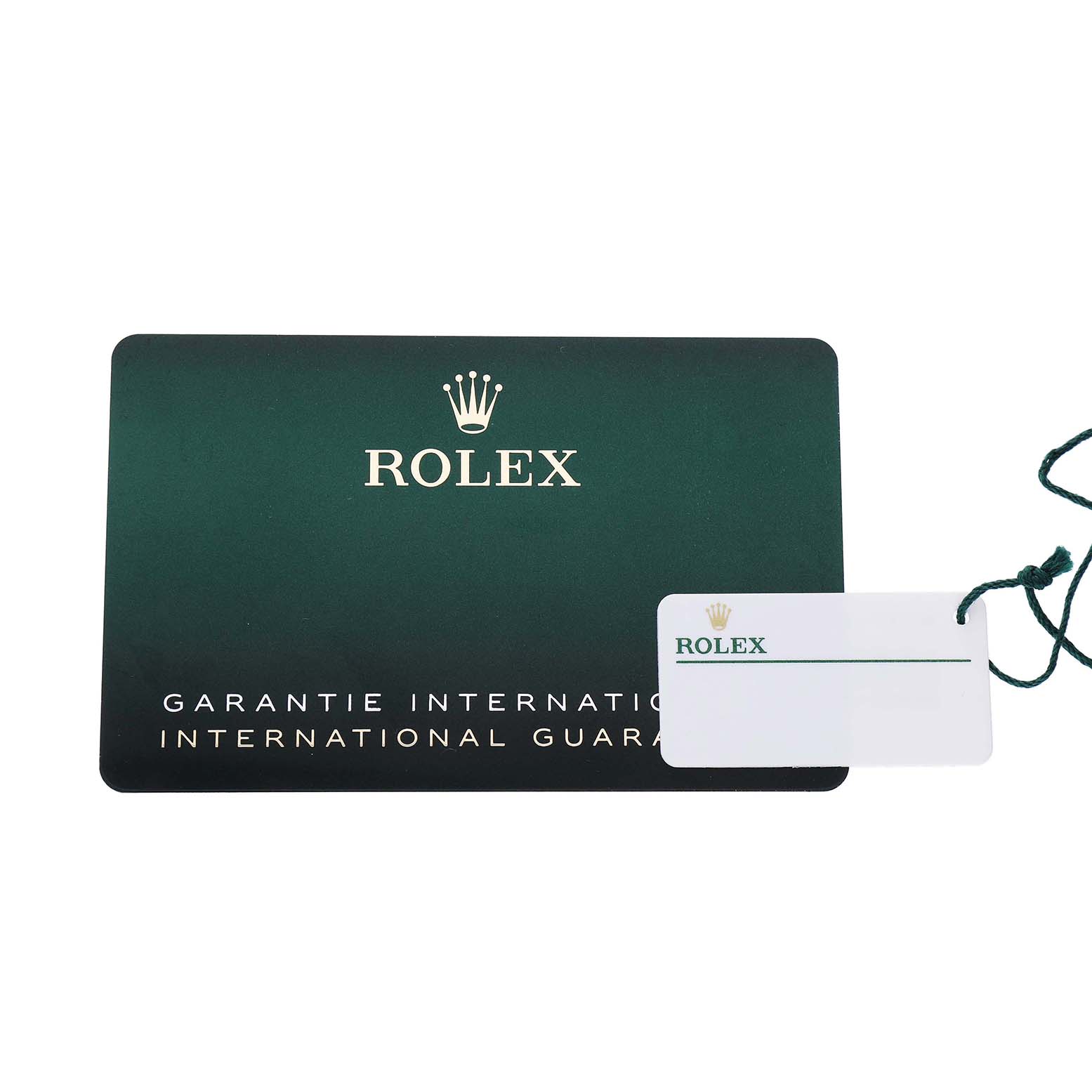 The image shows the international guarantee card and tag for a Rolex GMT-Master 126710 Men's Stainless Steel Black Dial watch.