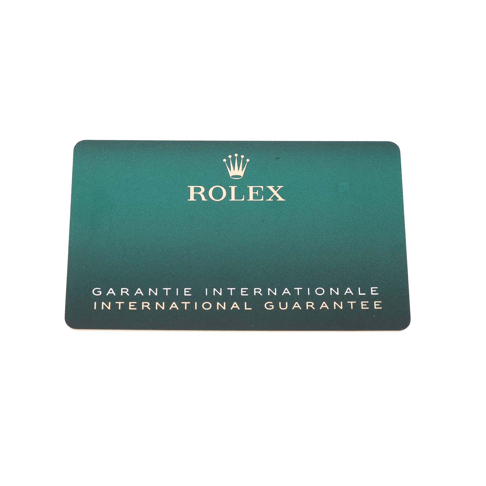 The image shows a Rolex international guarantee card for the Land-Dweller model, viewed from the front.