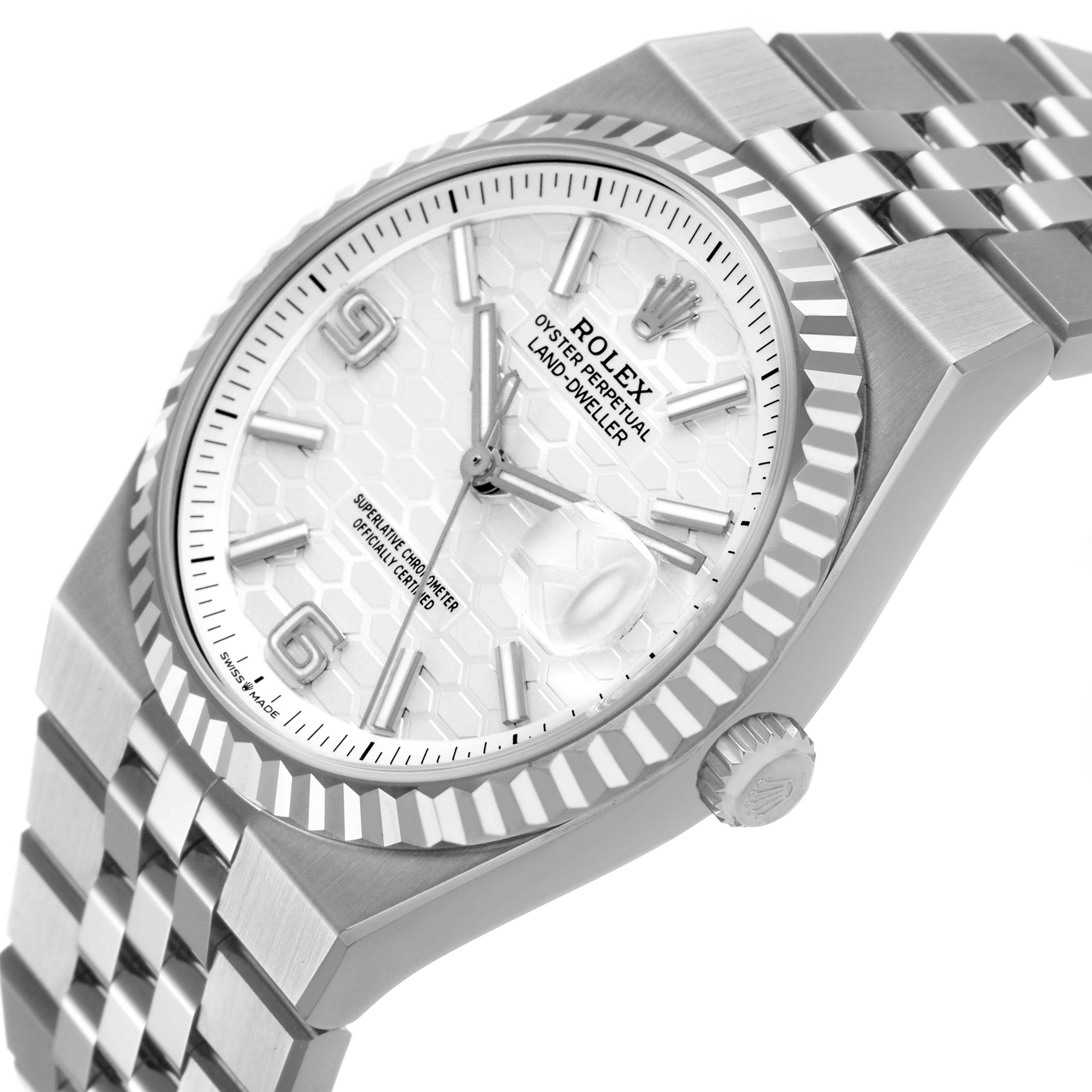 The Rolex Land-Dweller watch is shown at an angled close-up, highlighting the dial, bezel, and bracelet.