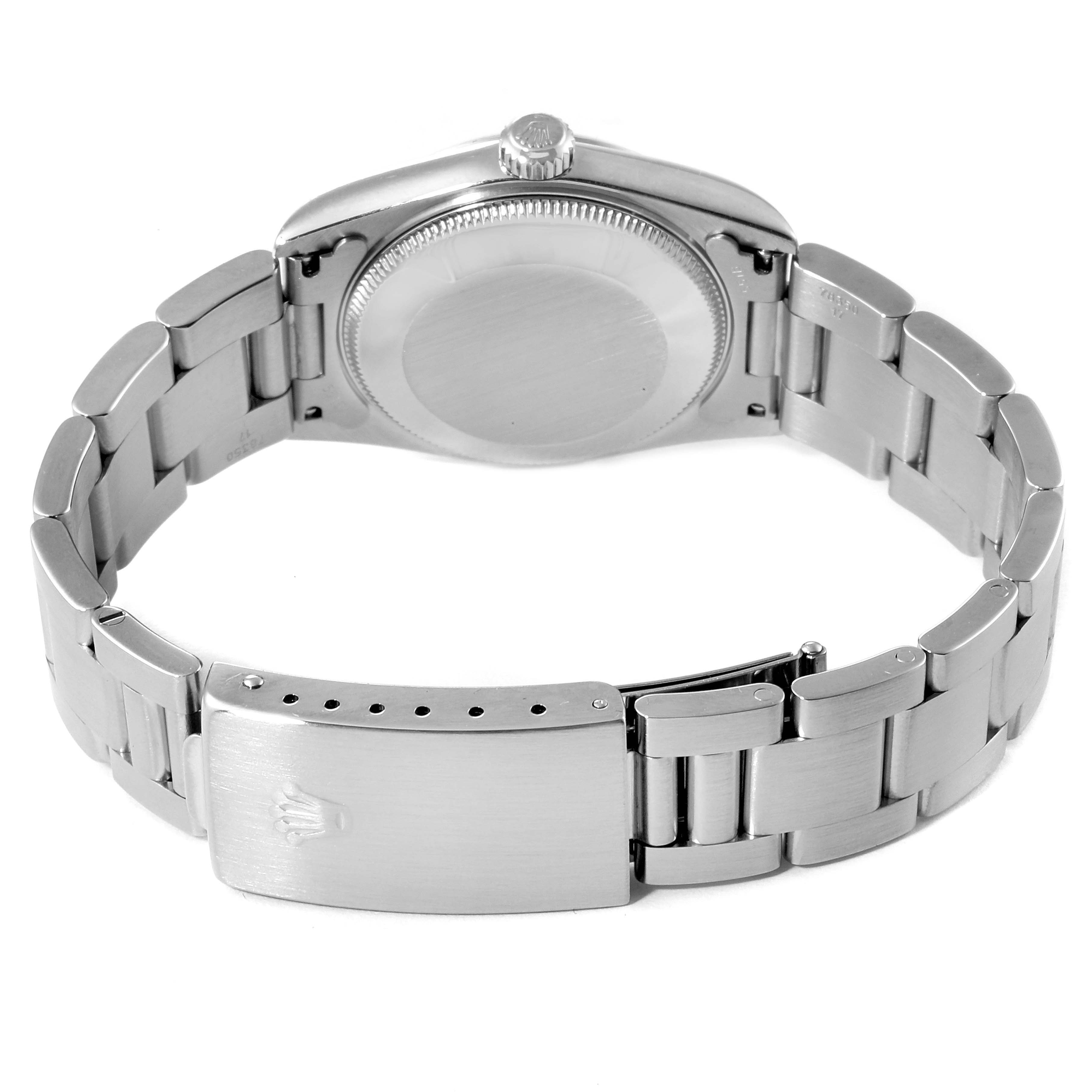 The image shows the back and bracelet of a Rolex Mid-Size 77080 Women's Stainless Steel Black Dial 77080 Women's Stainless Steel Black Dial model watch, featuring the clasp and caseback.