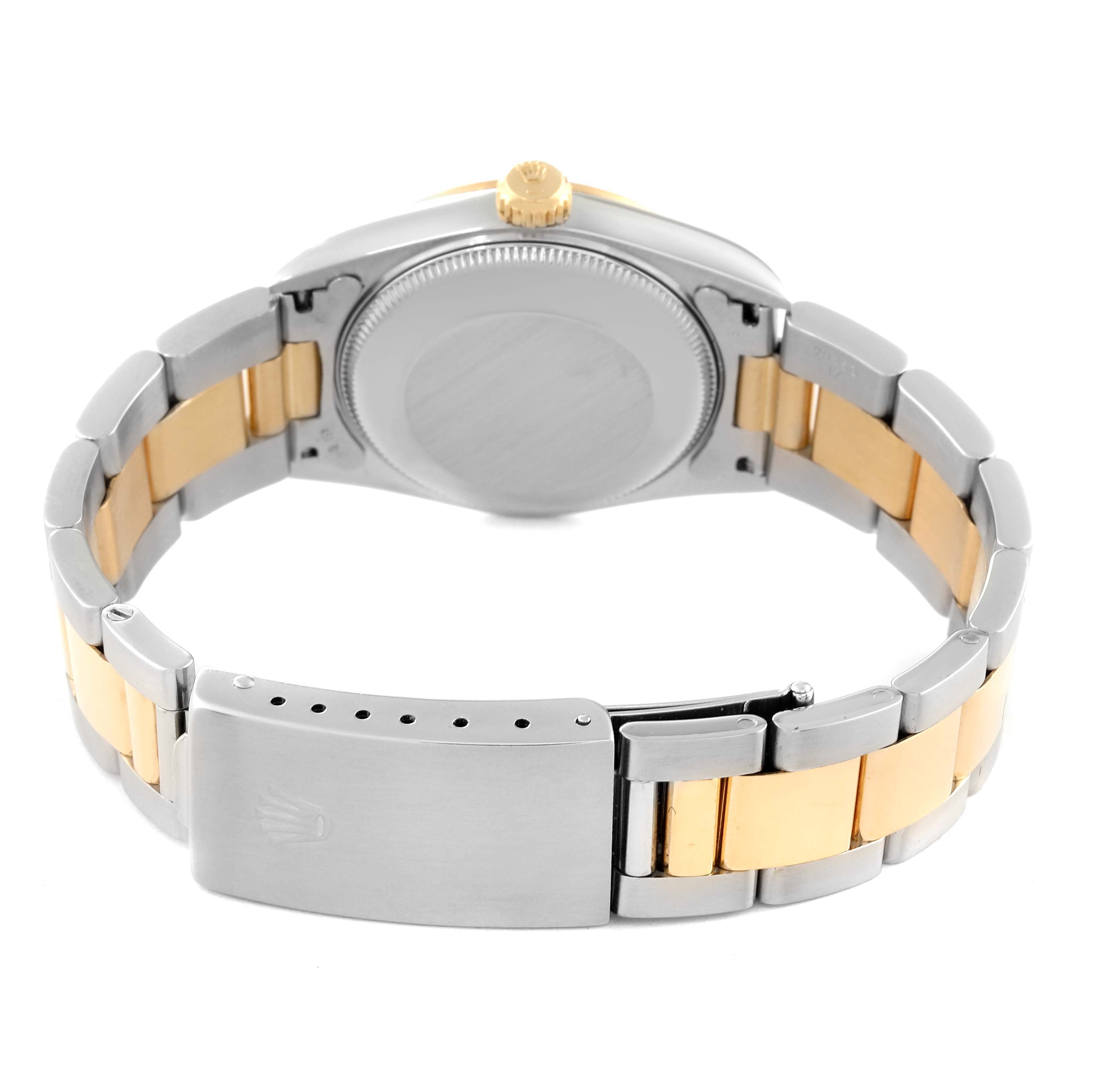 This image shows the back and clasp of a Rolex Mid-Size 67483 Women's Steel and Gold (two tone) Grey Dial 67483 Women's Steel and Gold (two tone) Grey Dial watch, highlighting its two-tone bracelet.