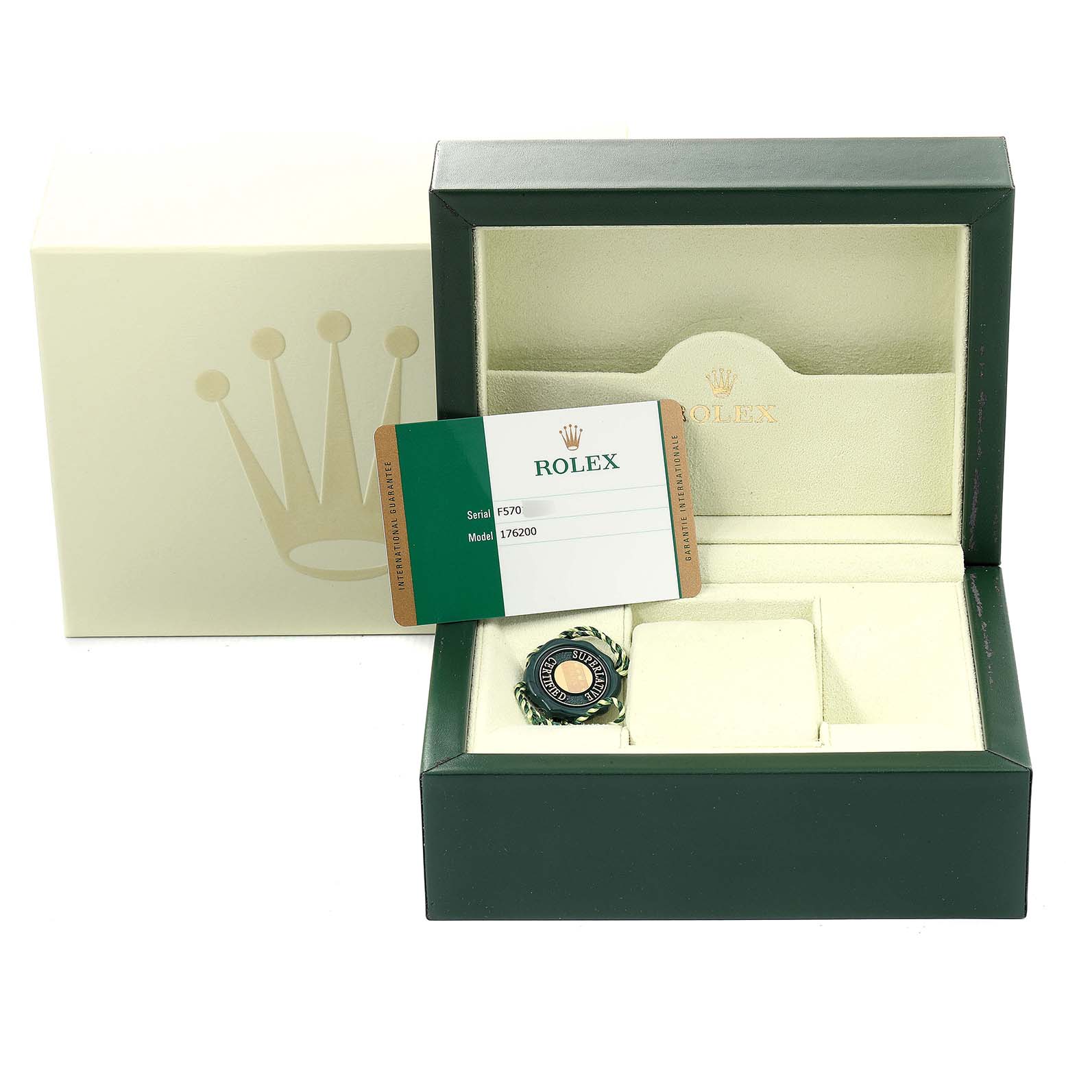 The image shows a Rolex Oyster Perpetual 176200 Women
s Stainless Steel Pink Dial 176200 Women
s Stainless Steel Pink Dial watch box and guarantee card in an open box, partially concealing the watch.