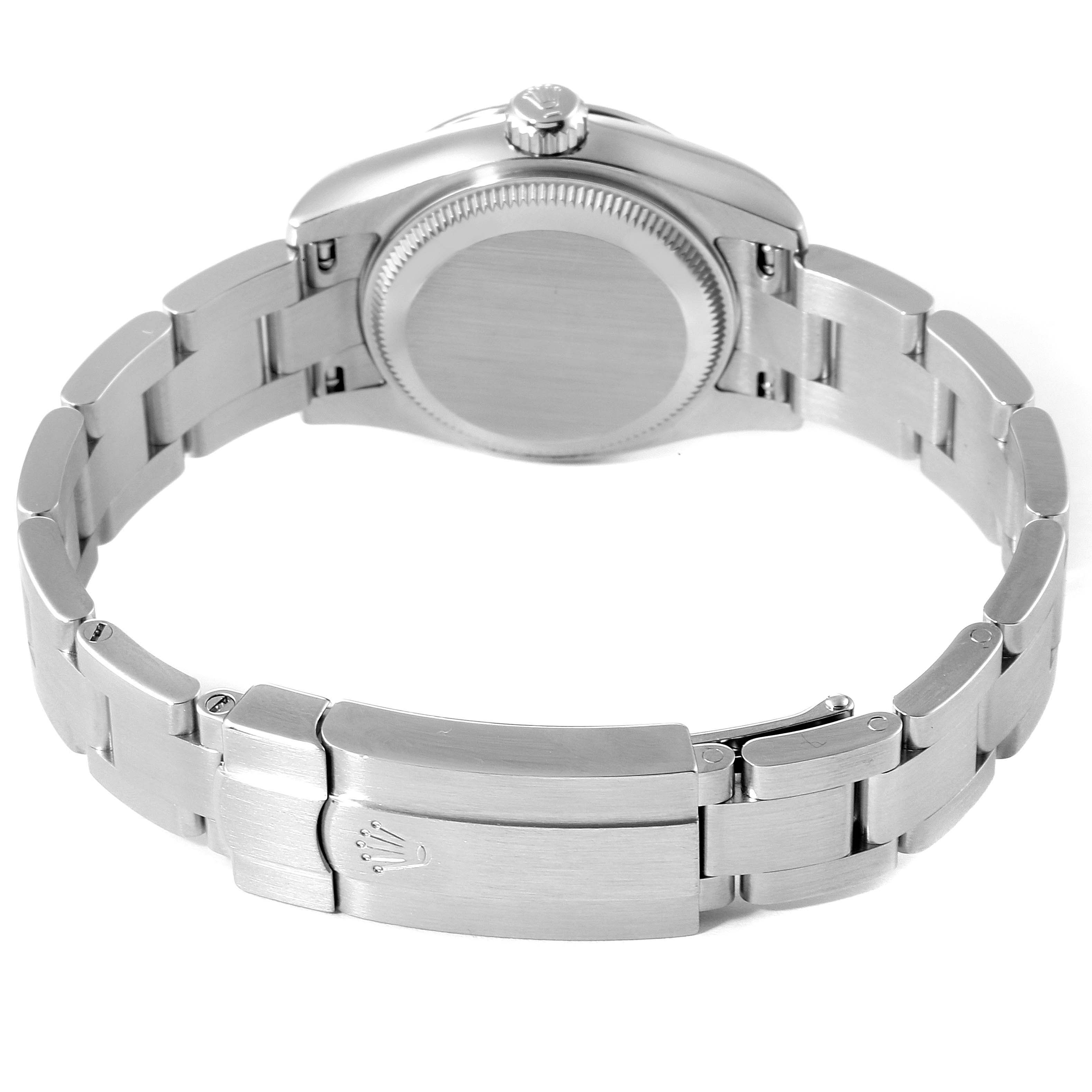 The image shows the back angle of a Rolex Oyster Perpetual 176200 Women
s Stainless Steel Pink Dial 176200 Women
s Stainless Steel Pink Dial watch, highlighting its clasp and bracelet.