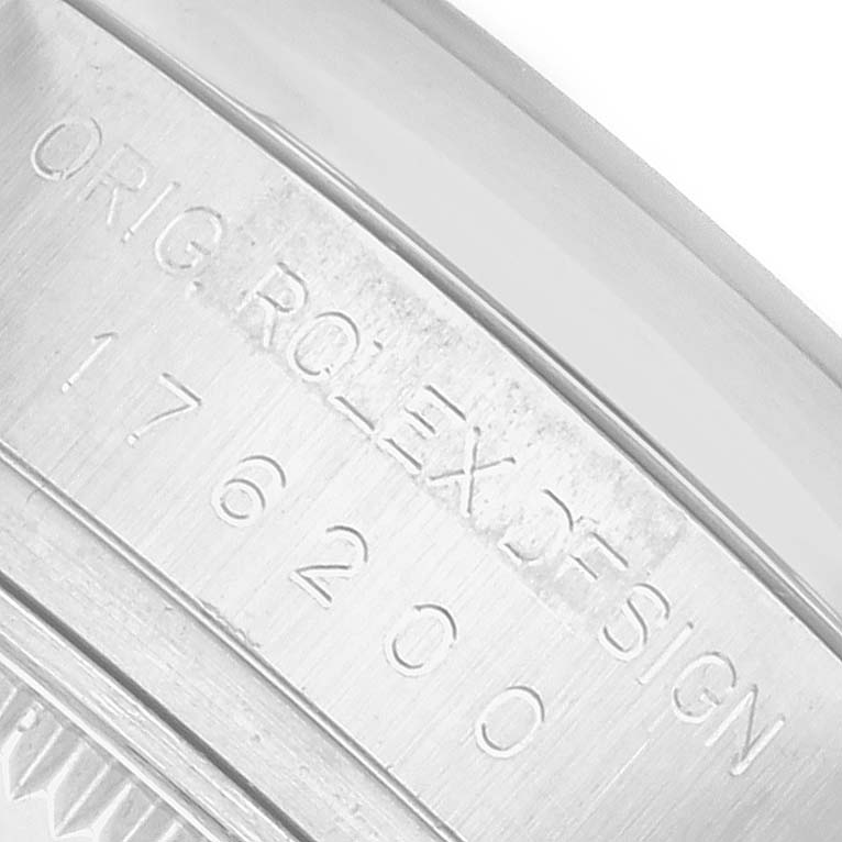 The image shows a close-up of the case engraving on a Rolex Oyster Perpetual 176200 Women
s Stainless Steel Silver Dial watch, displaying its model number.