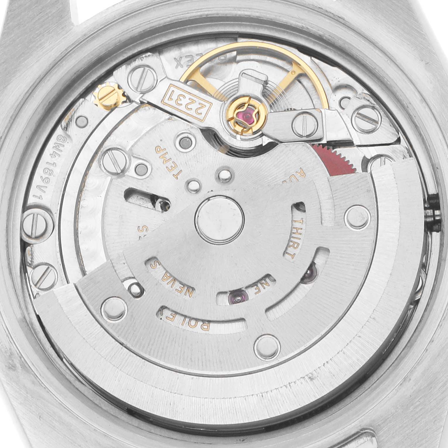 The image shows the internal movement of a Rolex Oyster Perpetual 176200 Women
s Stainless Steel Silver Dial watch from a back view, highlighting the rotor and balance wheel.