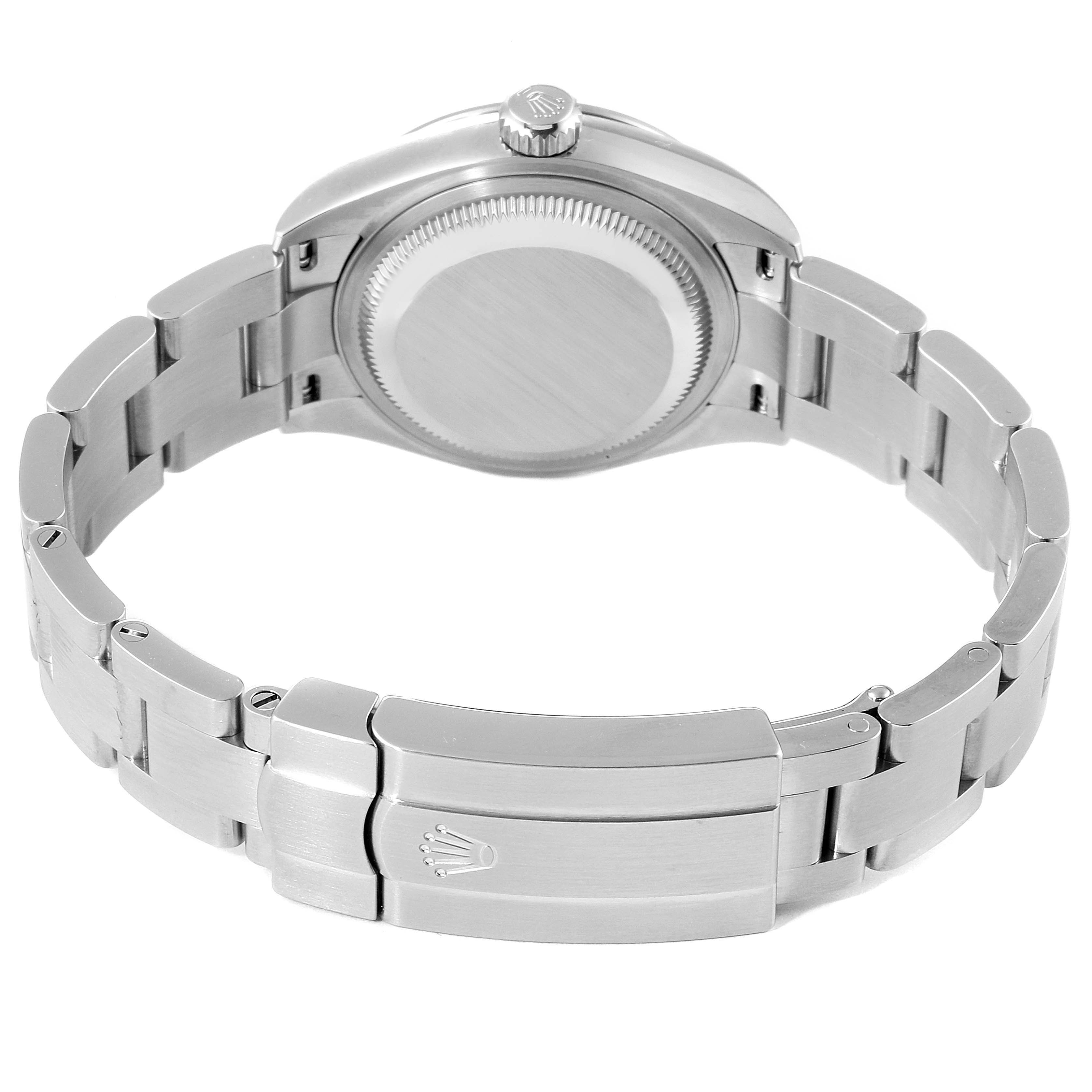 The image shows the back view of a Rolex Oyster Perpetual 276200 Women
s Stainless Steel Pink Dial 276200 Women
s Stainless Steel Pink Dial watch, highlighting the case back, bracelet, and clasp.