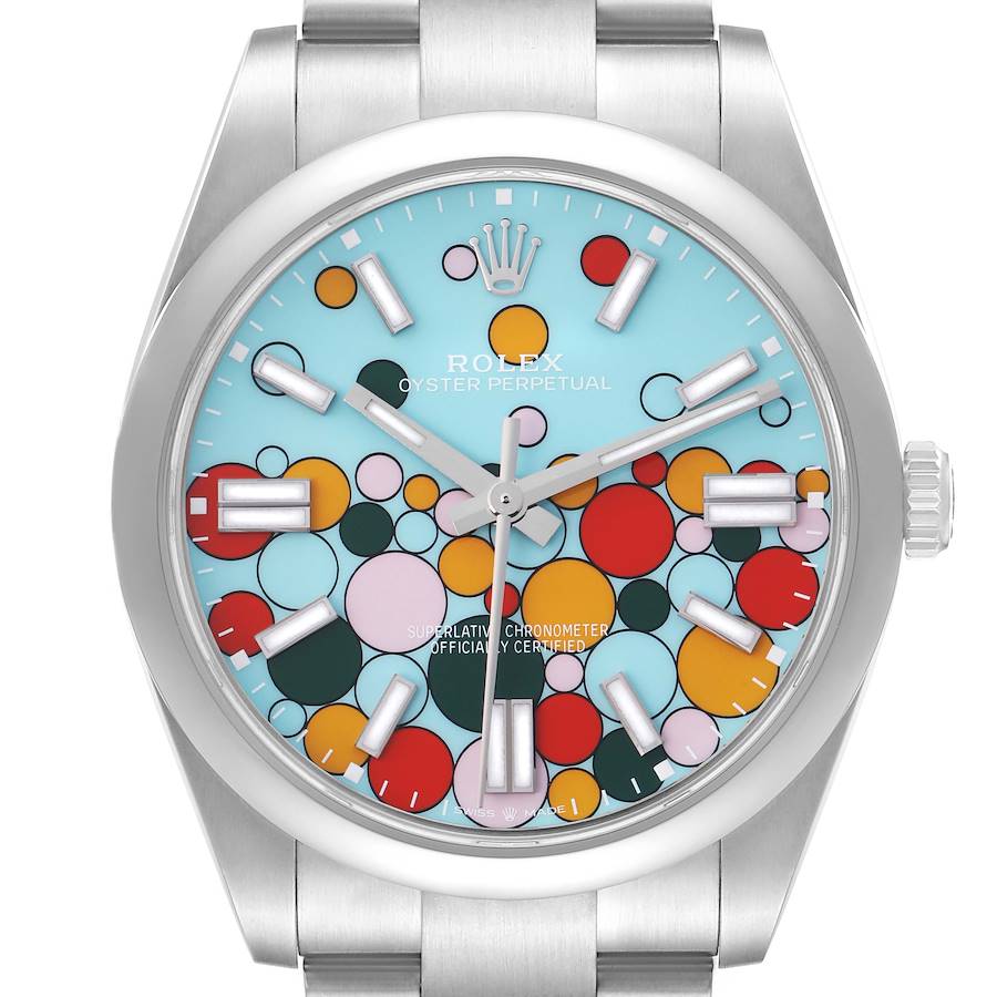 The Rolex Oyster Perpetual 124300 Men's Stainless Steel Blue Dial watch is shown from a front angle, highlighting the colorful dial and stainless steel case.