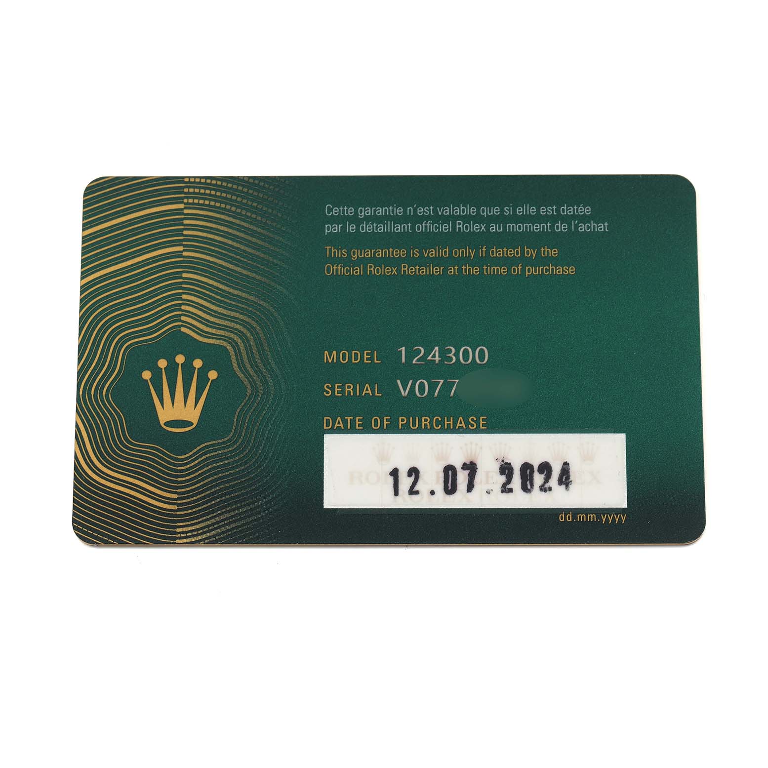 This image shows a warranty card for the Rolex Oyster Perpetual 124300 Men
s Stainless Steel Blue Dial model, displaying model number, serial number, and purchase date.