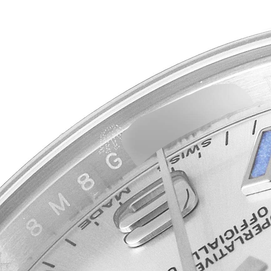 The image shows a close-up of the dial and rehaut of a Rolex Oyster Perpetual 176200 Women's Stainless Steel Silver Dial 176200 Women's Stainless Steel Silver Dial watch, focusing on the "SWISS MADE" text and part of the hour markers.