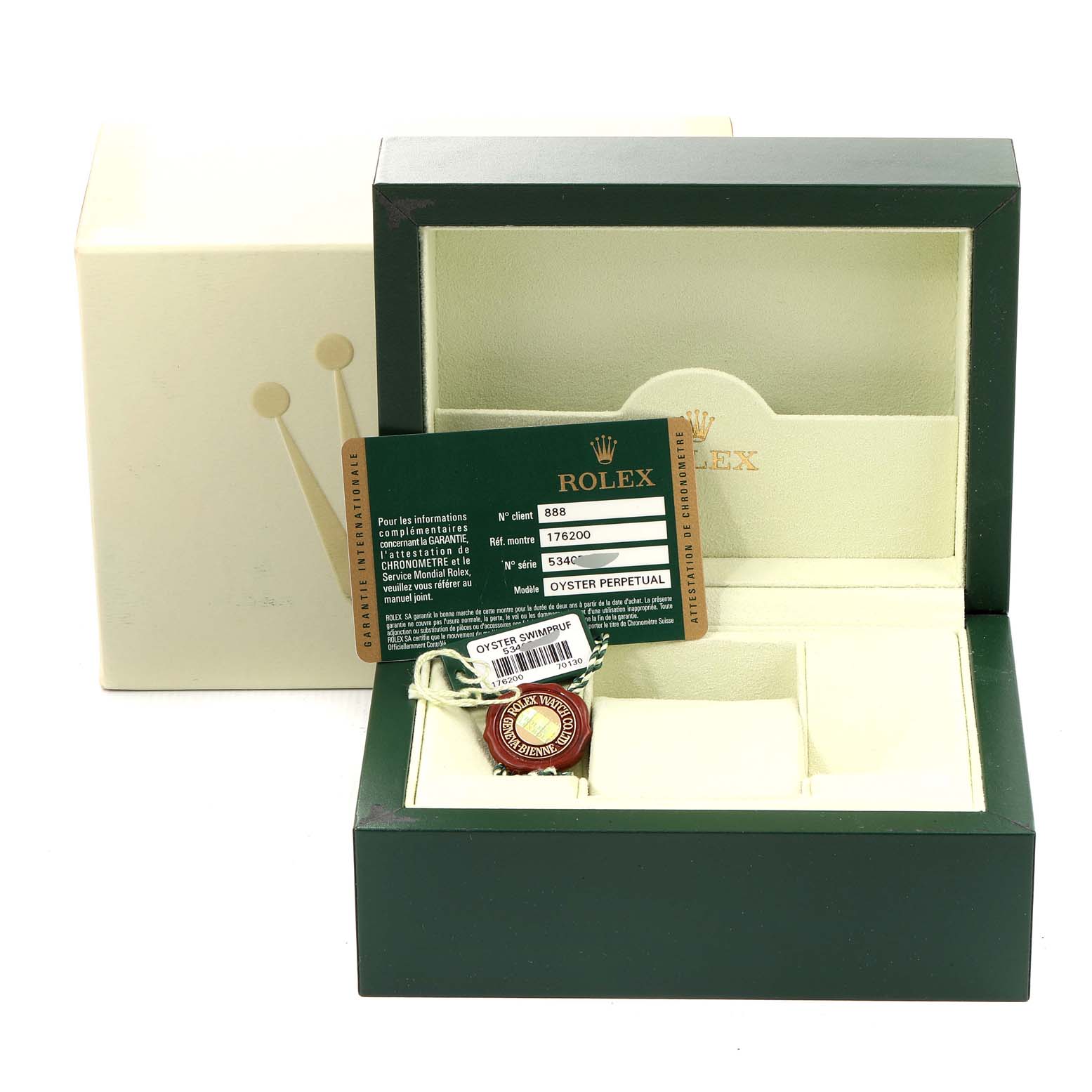 A Rolex Oyster Perpetual 176200 Women's Stainless Steel Silver Dial 176200 Women's Stainless Steel Silver Dial watch box is shown, featuring the certification card and tag placed inside.