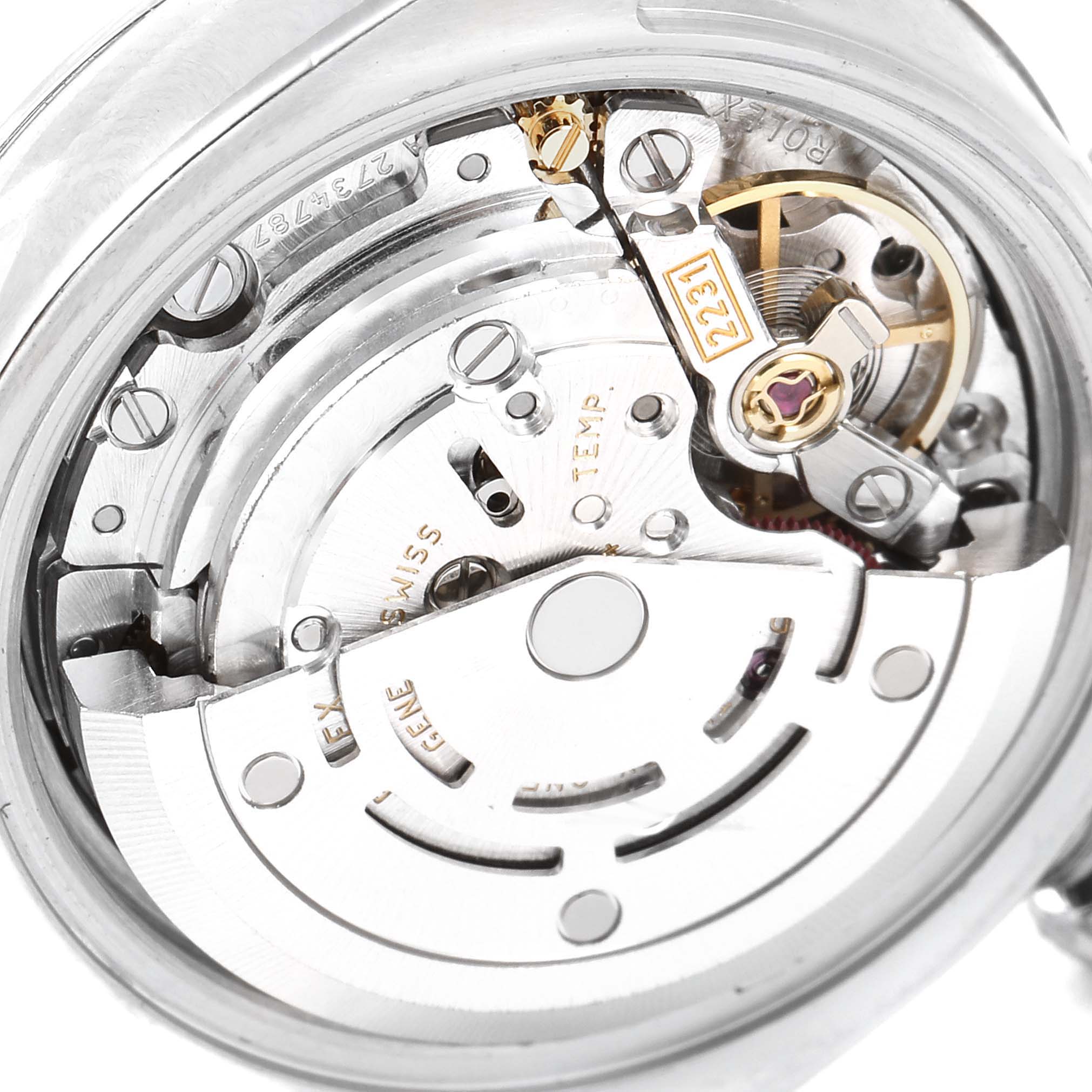 This is a close-up view of the internal movement of a Rolex Oyster Perpetual 176200 Women's Stainless Steel Silver Dial 176200 Women's Stainless Steel Silver Dial watch, showing the intricate mechanics.
