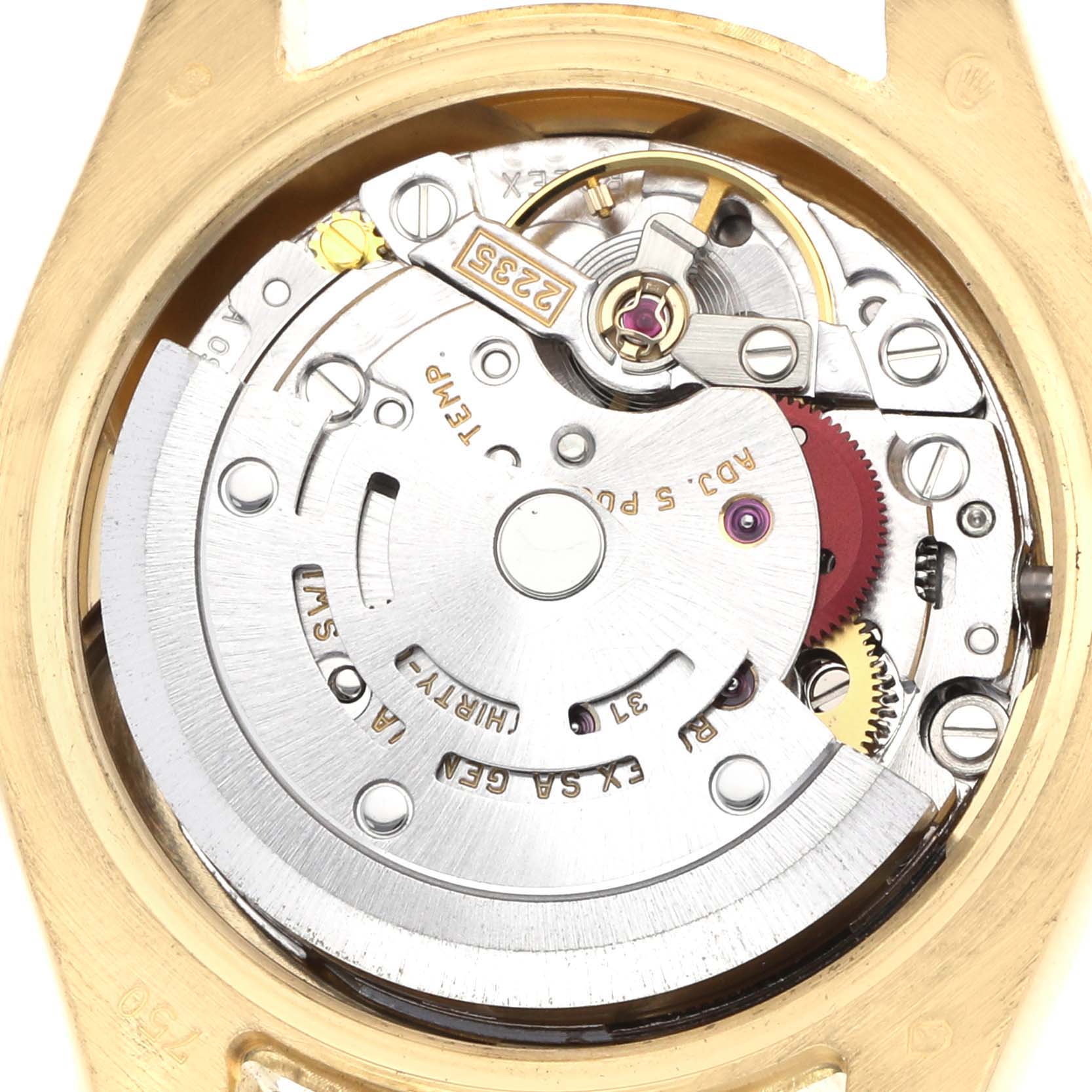 The image shows the internal mechanism of a Rolex President 179168 Men
s Yellow Gold White Dial watch from a top-down angle, highlighting the movement components.