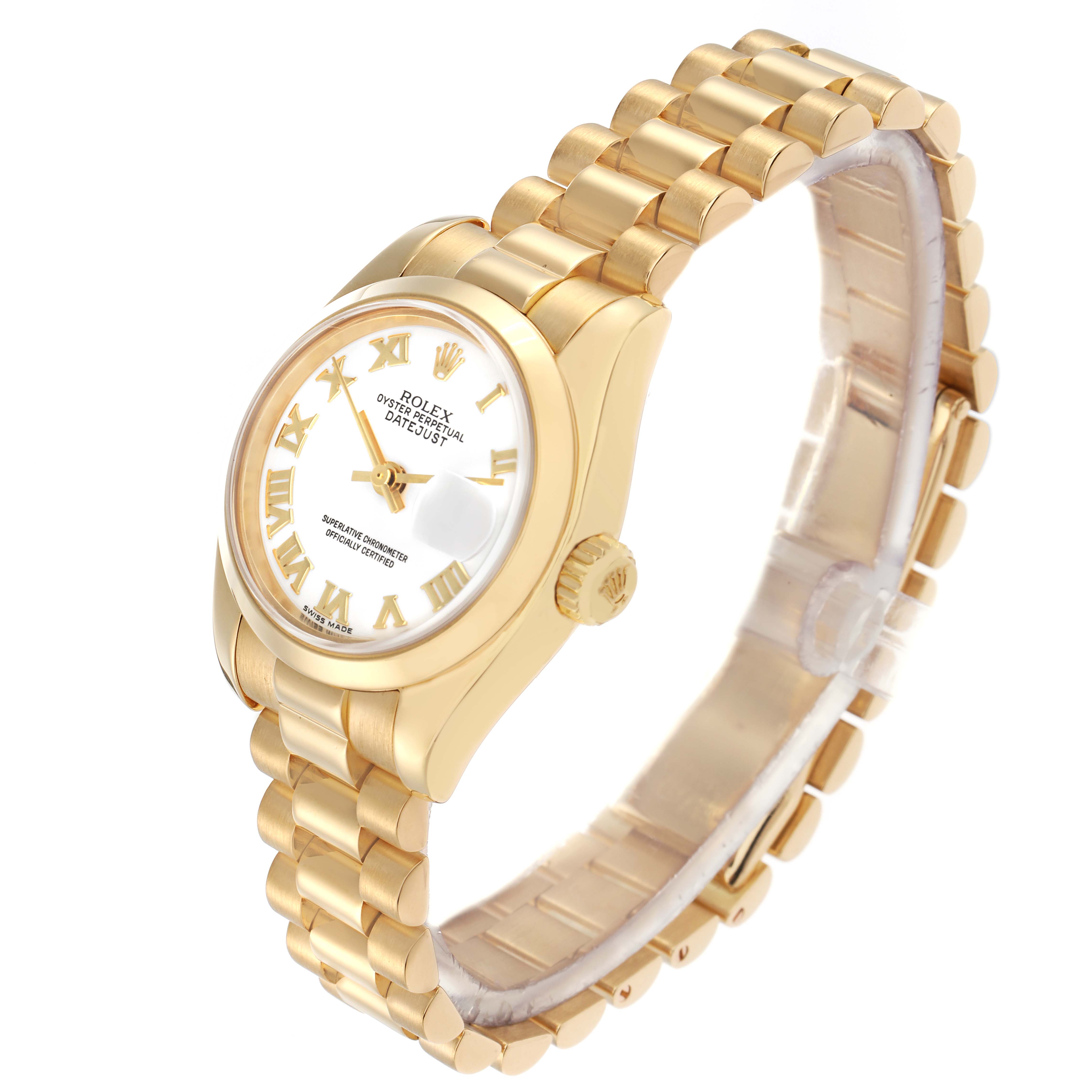 The Rolex President 179168 Men
s Yellow Gold White Dial watch is shown at an angle displaying the face, Roman numeral markers, case, crown, and part of the bracelet.