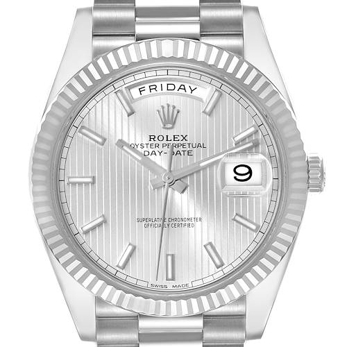 The image shows a front view of a Rolex President Day-Date watch, highlighting its face, bracelet, and fluted bezel.