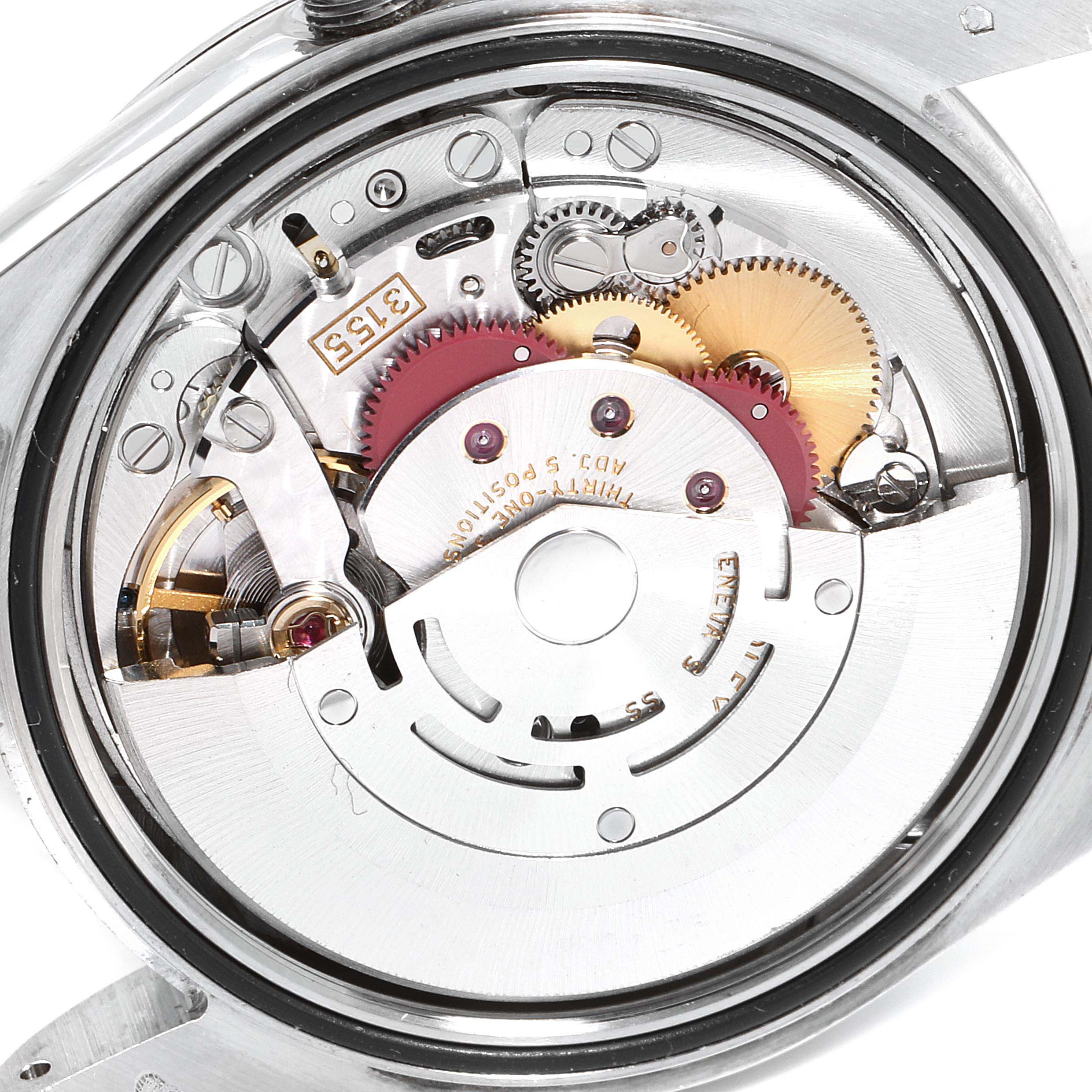 This image shows the internal mechanism of a Rolex President 118239 Men's White Gold Silver Dial 118239 Men's White Gold Silver Dial model watch from a back angle, revealing gears and components.