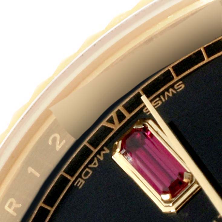 This close-up shows the dial and one of the hour markers of a Rolex President 118138 Men's Yellow Gold Black Dial 118138 Men's Yellow Gold Black Dial model watch.