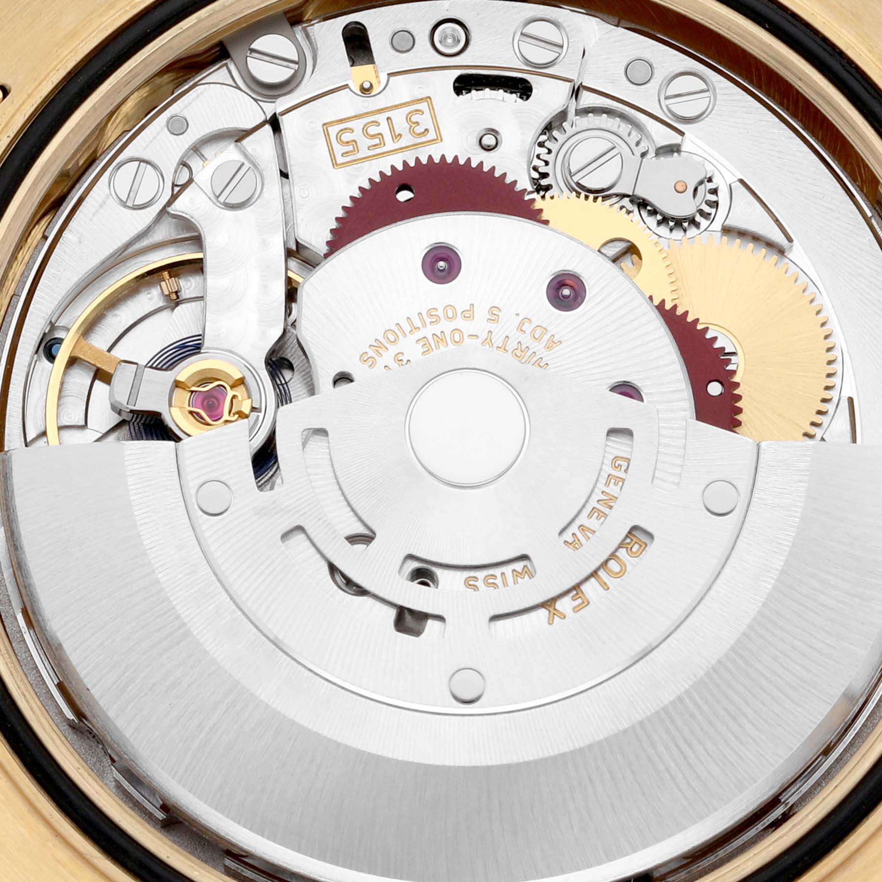 The image shows the intricate mechanical movement of a Rolex President 118138 Men's Yellow Gold Black Dial 118138 Men's Yellow Gold Black Dial model.