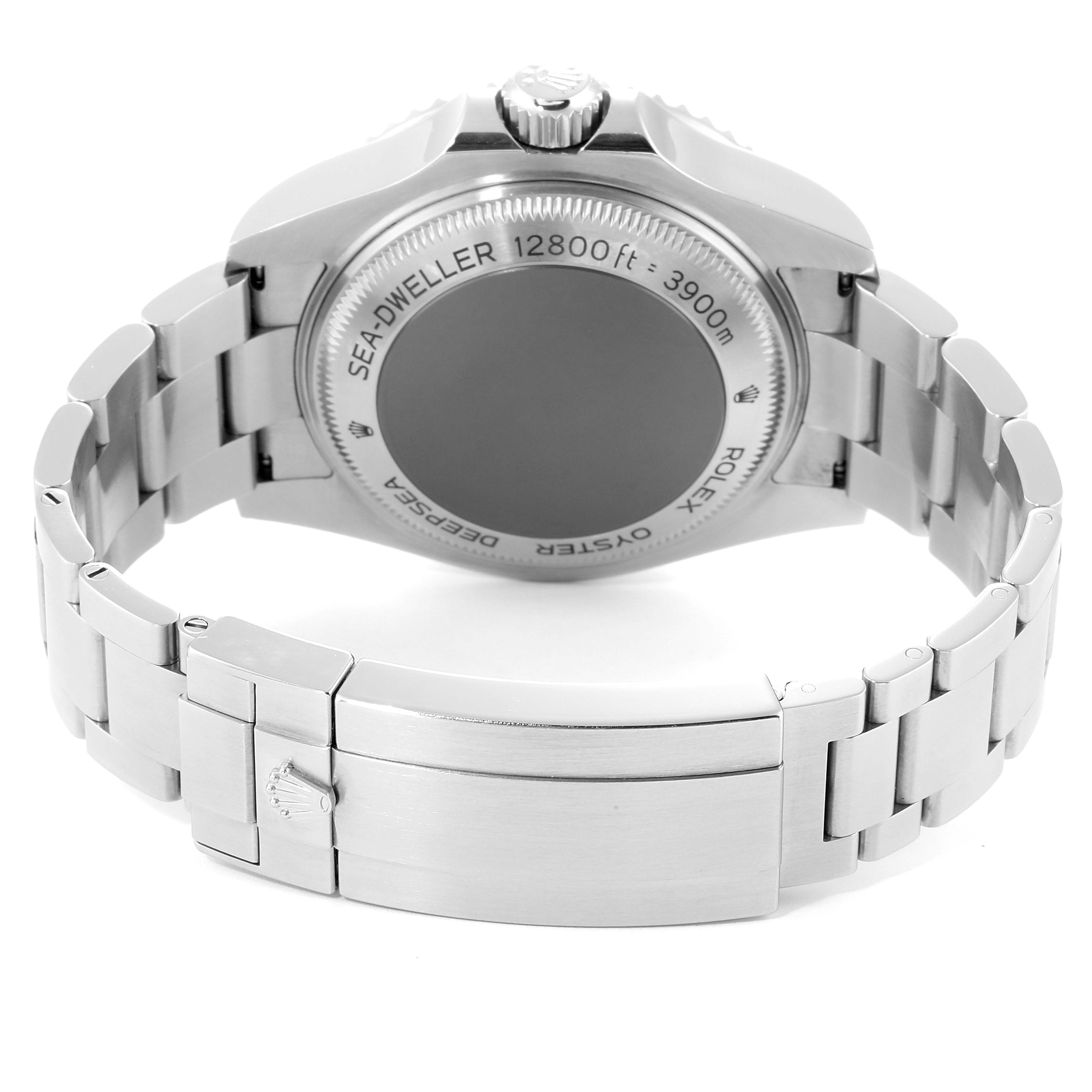 The image shows the back view of a Rolex Sea-Dweller 126660 Men
s Stainless Steel Blue Dial 126660 Men
s Stainless Steel Blue Dial watch, highlighting its case back and bracelet clasp.