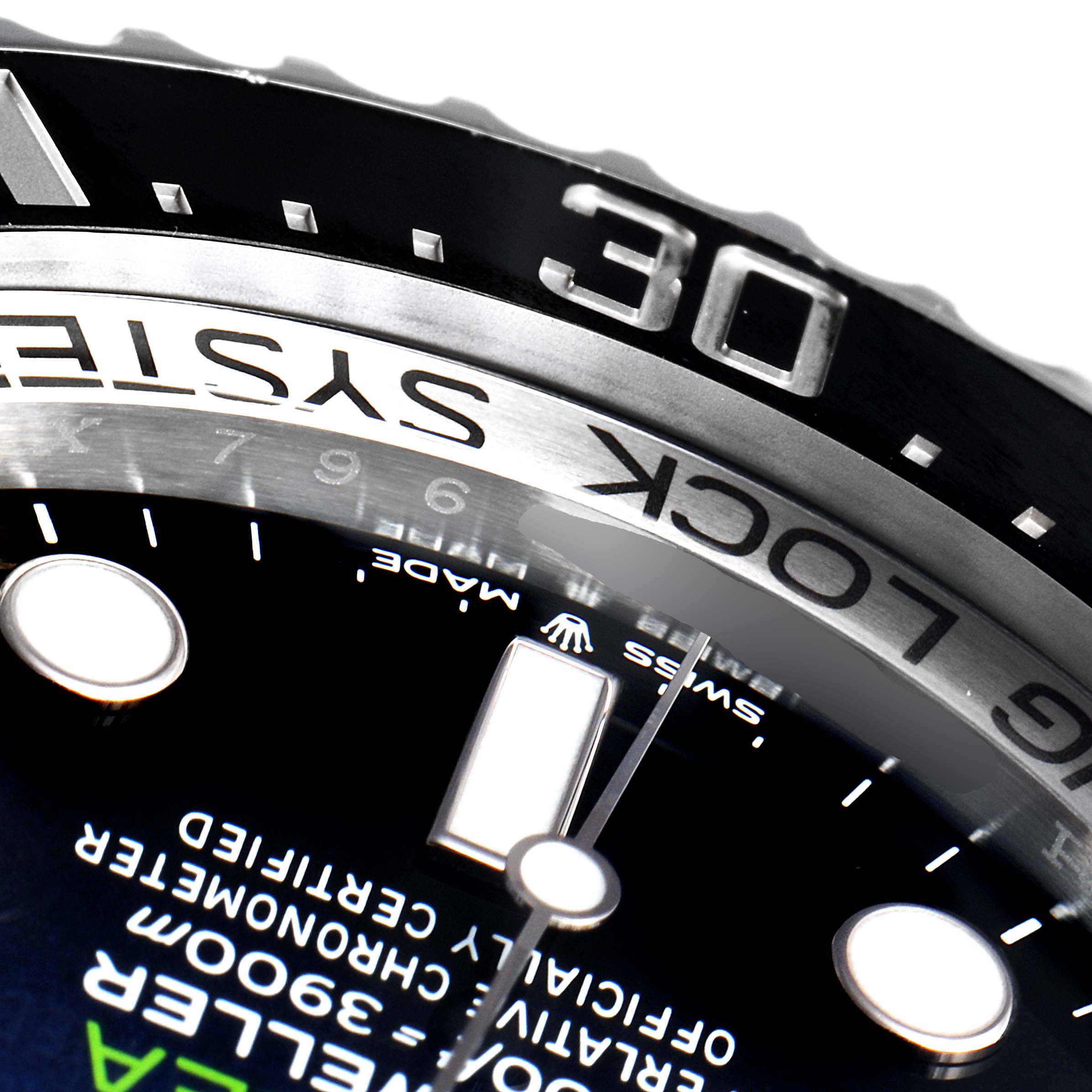 Close-up of the Rolex Sea-Dweller 126660 Men
s Stainless Steel Blue Dial 126660 Men
s Stainless Steel Blue Dial showing the bezel, part of the dial, and text 
RING LOCK SYSTEM
.