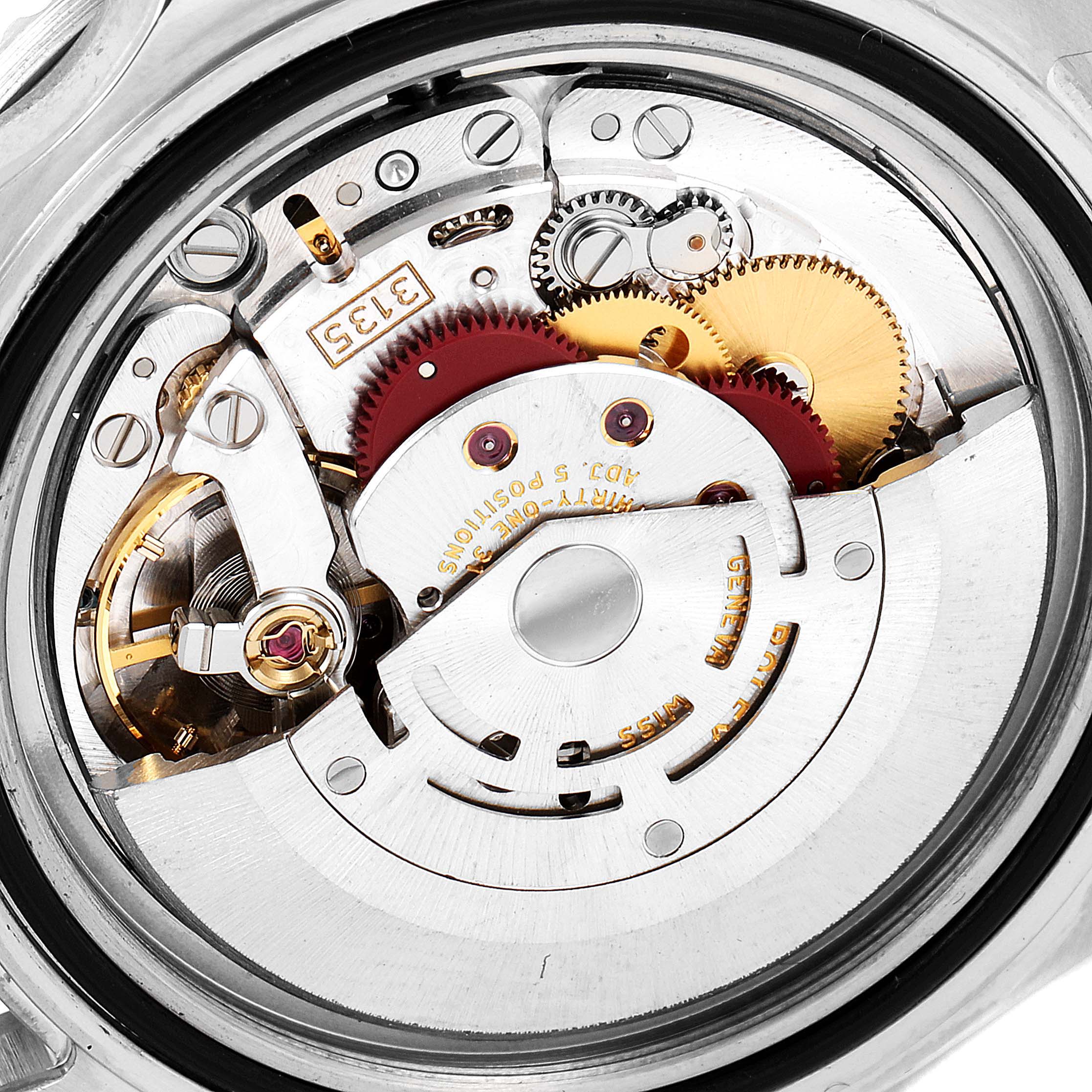 This image shows the movement mechanism of a Rolex Submariner 16610 Men
s Stainless Steel Black Dial 16610 Men
s Stainless Steel Black Dial watch at a close-up angle.