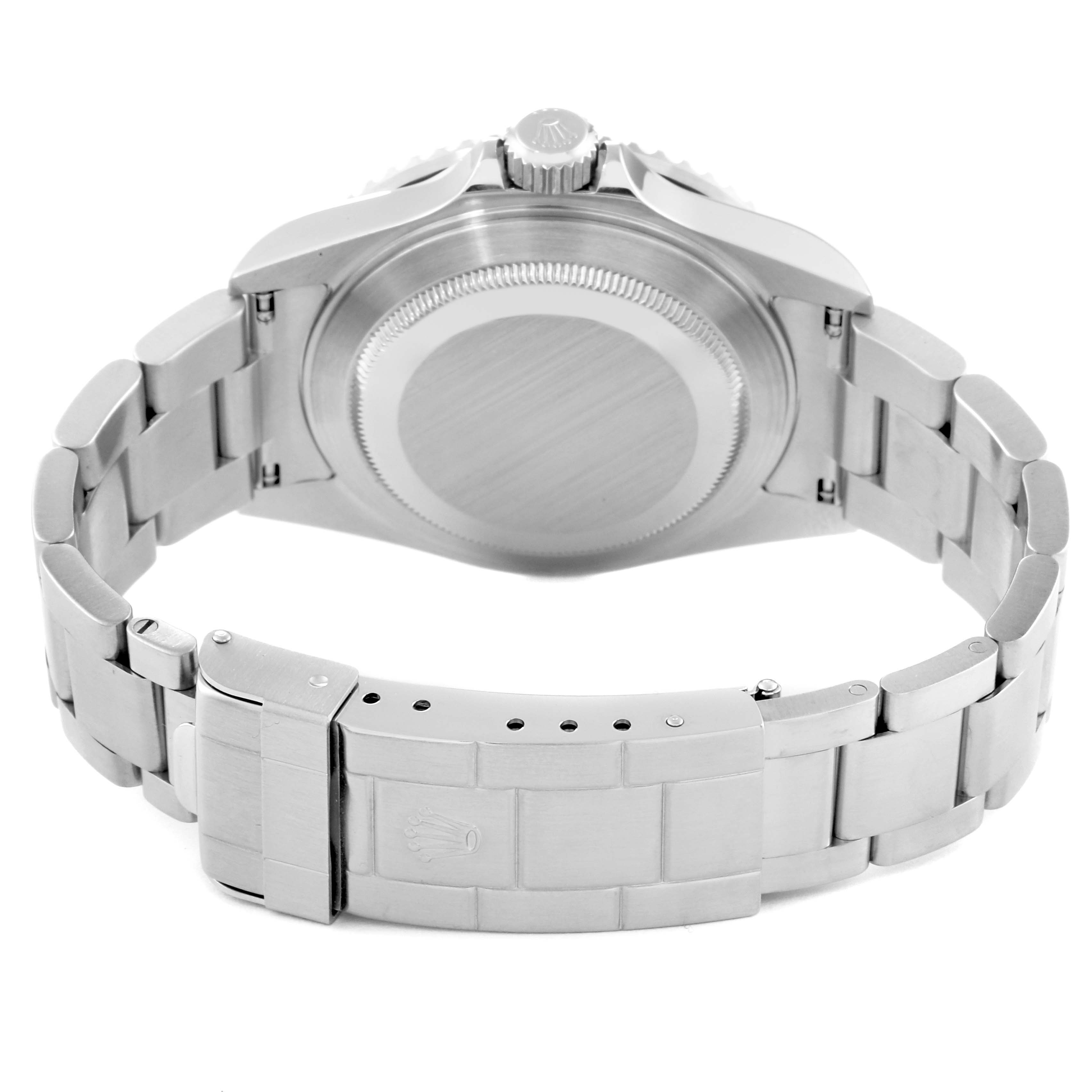 The image shows the back of a Rolex Submariner 16610 T Men
s Stainless Steel Black Dial 16610 T Men
s Stainless Steel Black Dial watch, including the case back, crown, and bracelet with a clasp.