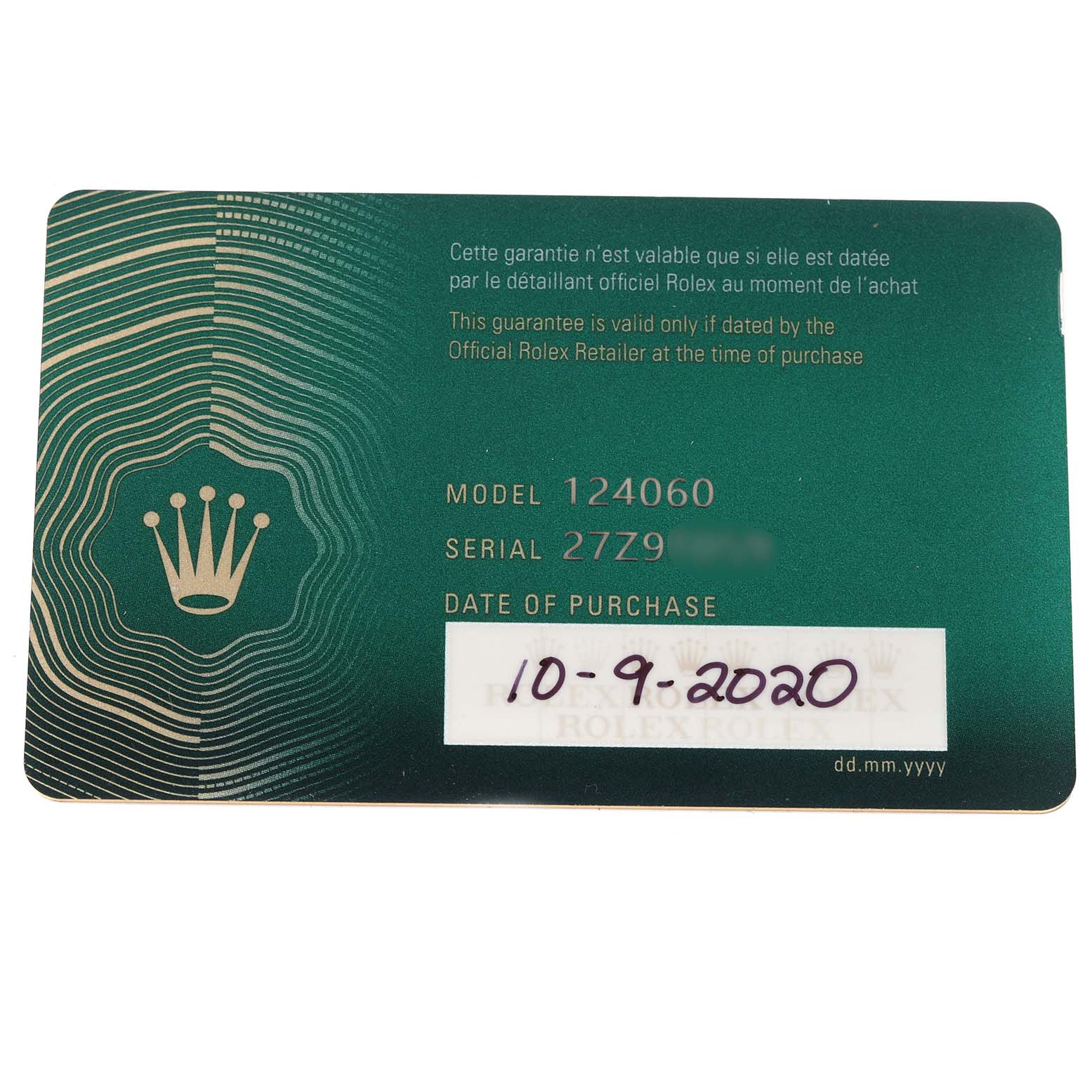 The image shows a warranty card for the Rolex Submariner 124060 Men
s Stainless Steel Black Dial model, displaying the model, serial number, and purchase date.