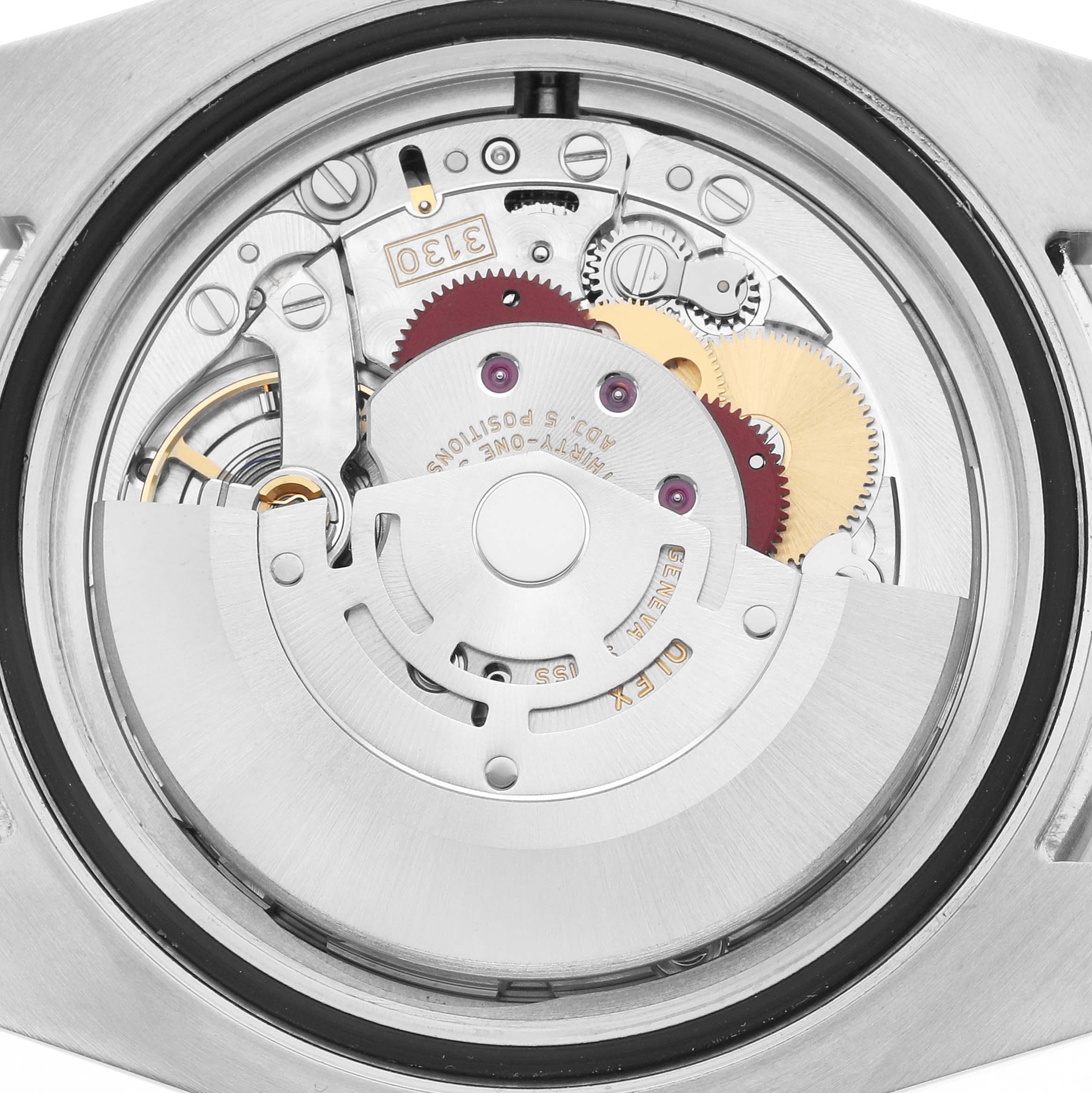 The image shows the movement and internal mechanism of a Rolex Submariner 114060 Men's Stainless Steel Black Dial watch from a rear angle.