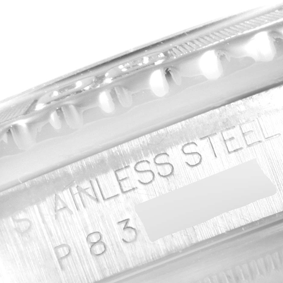 This image shows a close-up of the case side of the Rolex Turn-o-Graph 16264 Men
s Stainless Steel Black Dial 16264 Men
s Stainless Steel Black Dial watch, highlighting the bezel and "STAINLESS STEEL" engraving.