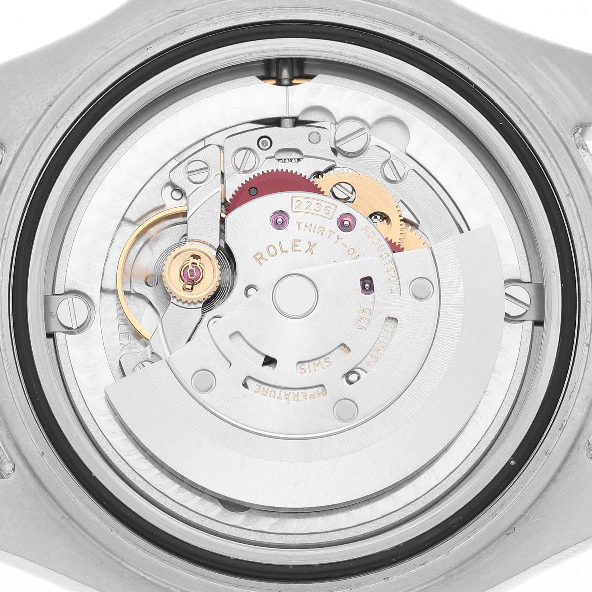The image shows the movement of a Rolex Yacht-Master 268622 Men's Stainless Steel Silver Dial watch from a back angle, featuring gears and mechanical components.