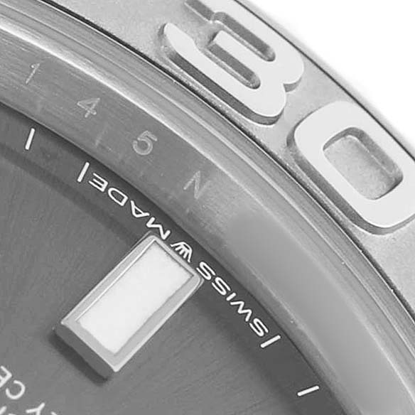 The image shows a close-up of the Rolex Yacht-Master 268622 Men's Stainless Steel Silver Dial bezel, part of the dial, and a "Swiss Made" marking.