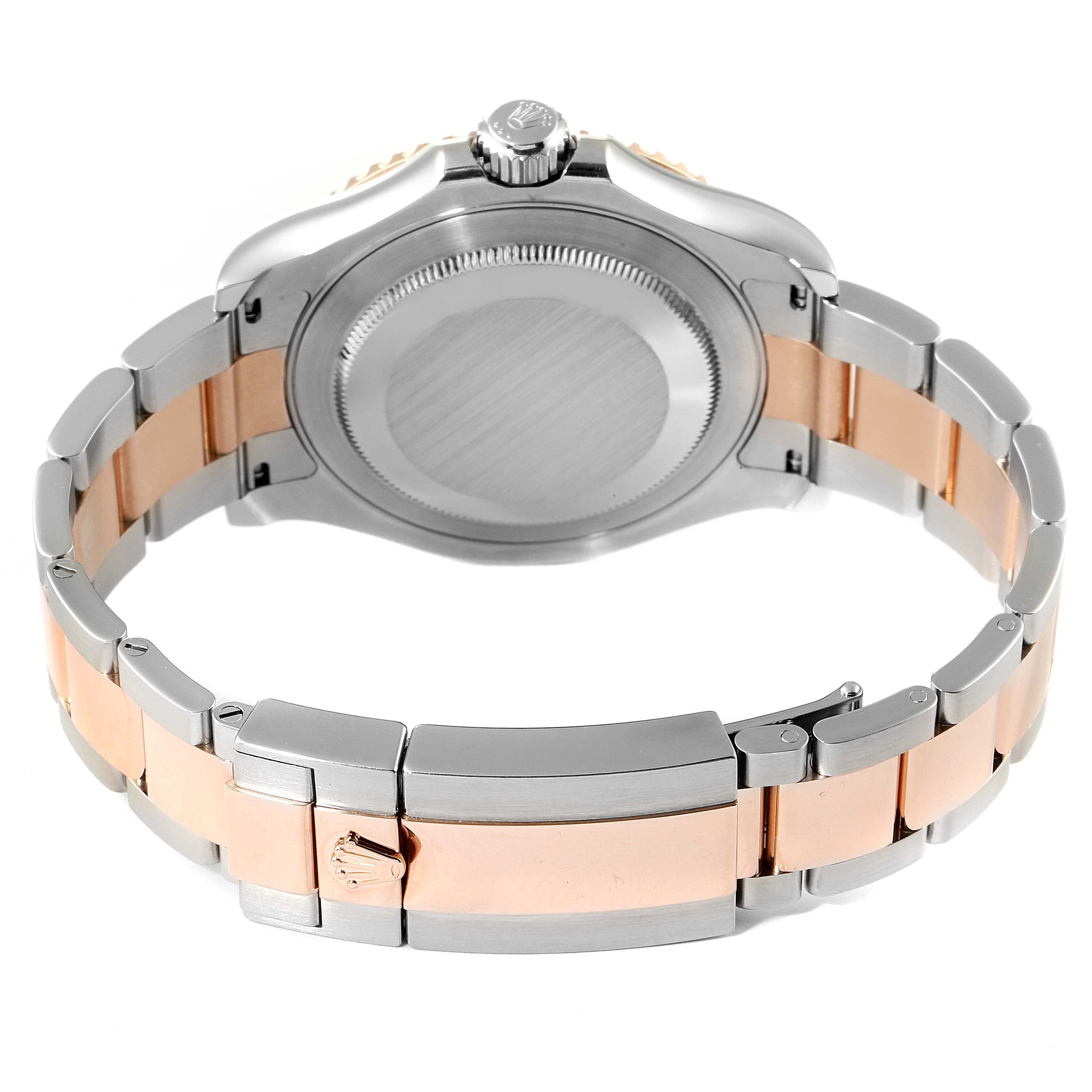 This image shows the back case and metal bracelet of a Rolex Yacht-Master 116621 Men's Steel and Gold (two tone) Black Dial 116621 Men's Steel and Gold (two tone) Black Dial watch from a rear angle.