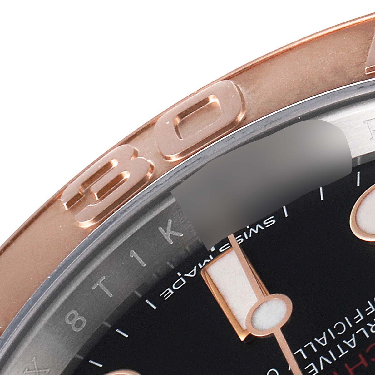 This close-up of a Rolex Yacht-Master 116621 Men's Steel and Gold (two tone) Black Dial 116621 Men's Steel and Gold (two tone) Black Dial watch shows the bezel and part of the dial.