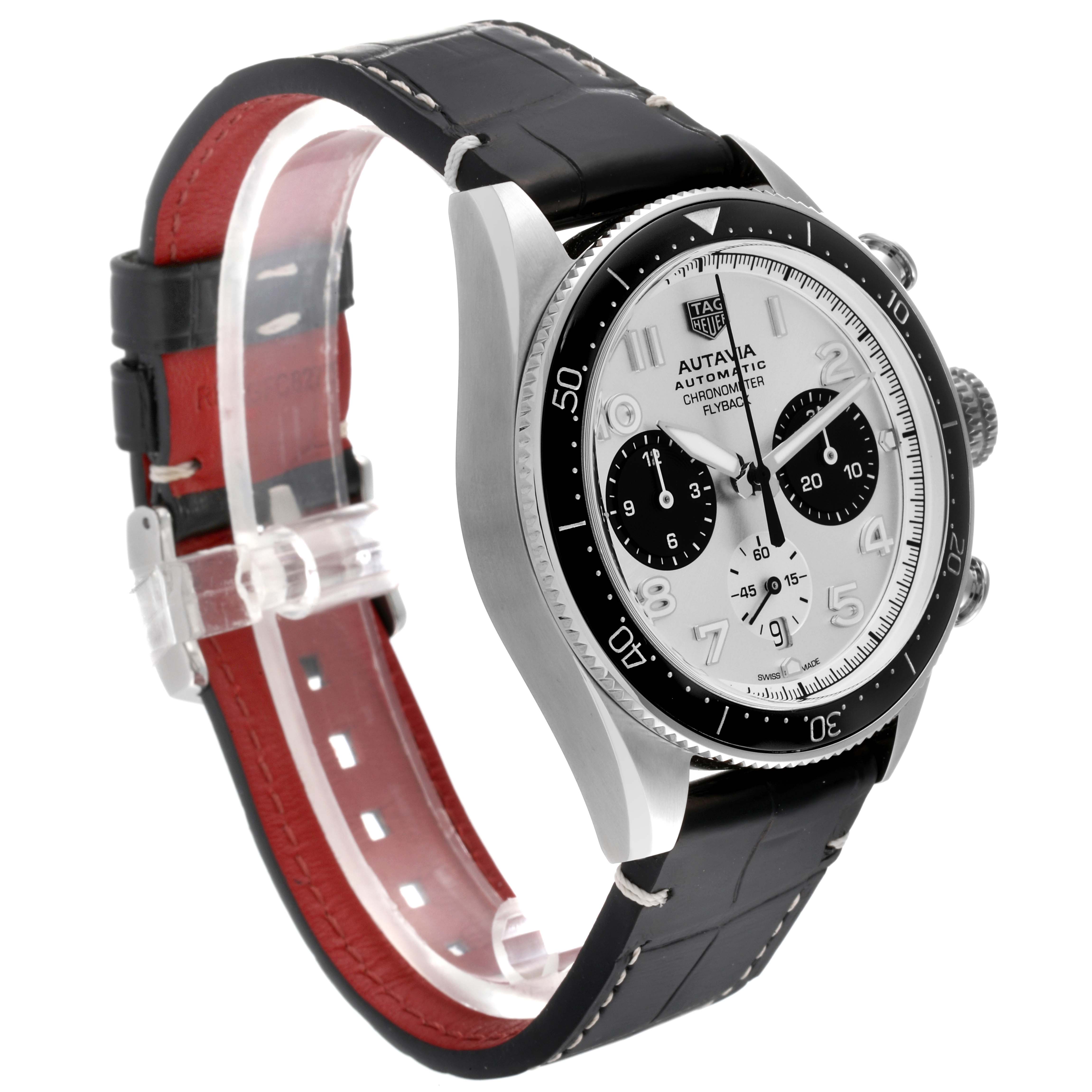 The image shows a side angle of the Tag Heuer Autavia CBE511B.FC8279 Men's Stainless Steel Black Dial CBE511B.FC8279 Men's Stainless Steel Black Dial watch, highlighting its face, bezel, and leather strap.