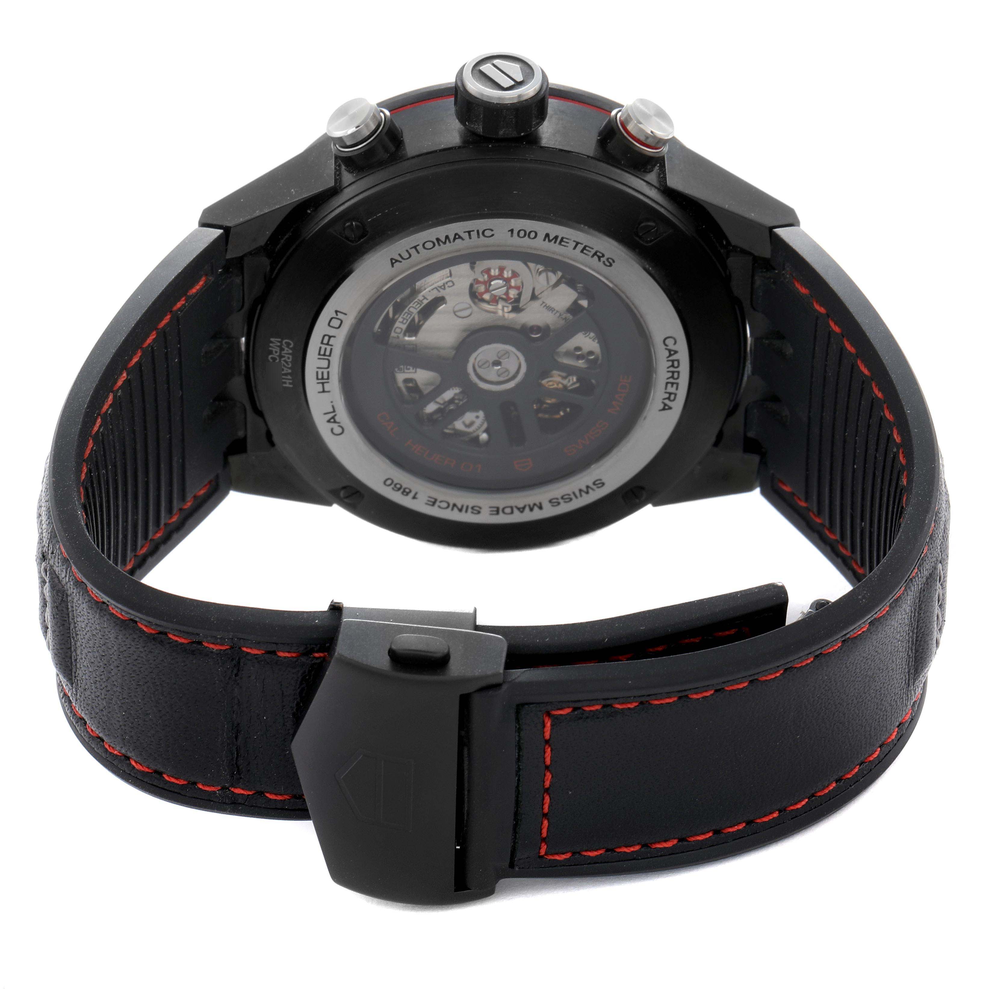 The Tag Heuer Carrera CAR2A1H Men
s Stainless Steel Transparent Dial watch is shown from the back, highlighting the case back, crown, pushers, and strap with red stitching.
