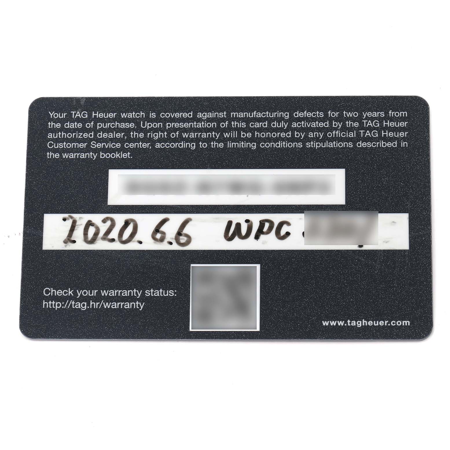 The image shows a warranty card for a Tag Heuer Carrera CAR2A1H Men
s Stainless Steel Transparent Dial, with text and blurred parts.