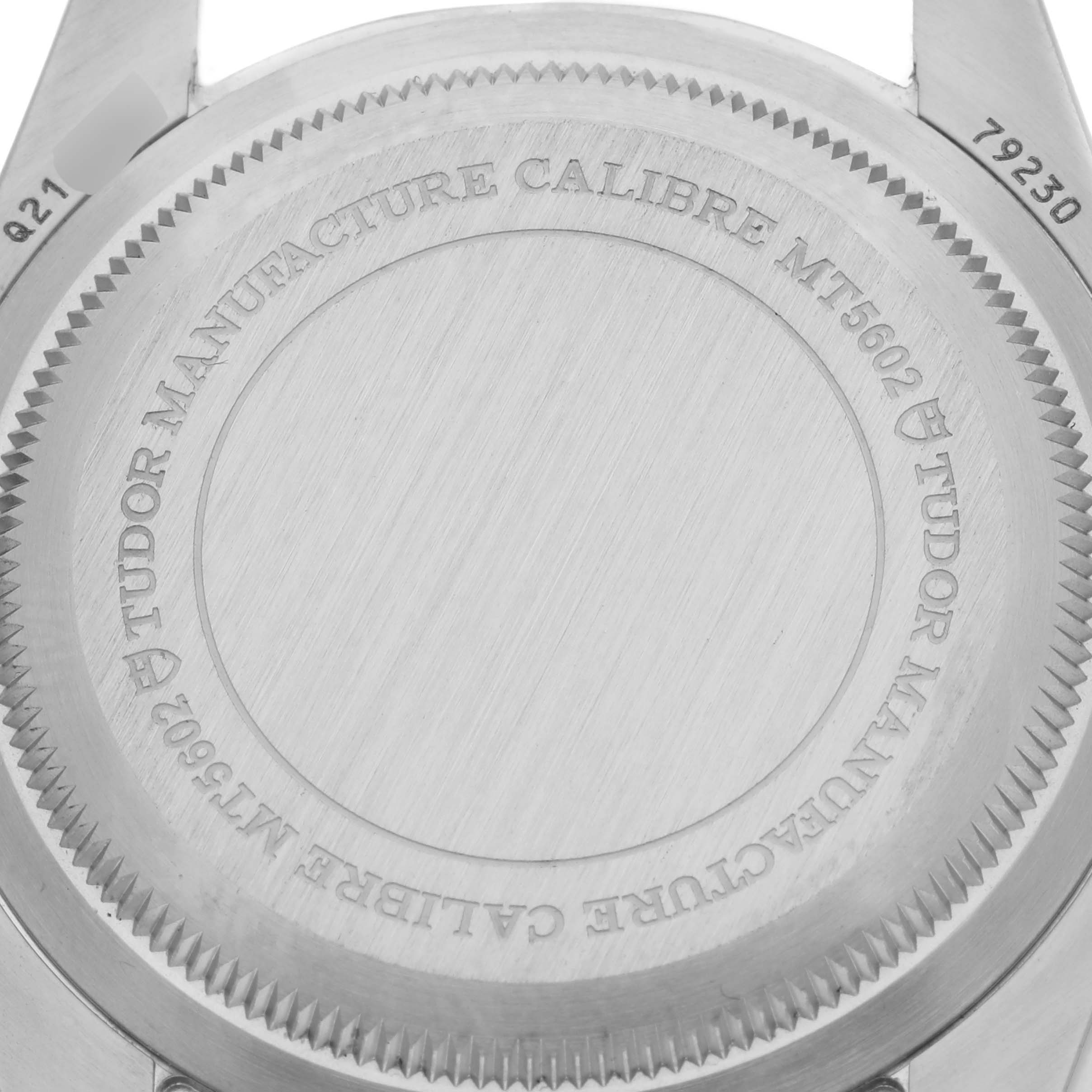 This image shows the back case of the Tudor Heritage Black Bay 79230R Men's Stainless Steel Black Dial 79230R Men's Stainless Steel Black Dial watch, featuring the engraved model information.