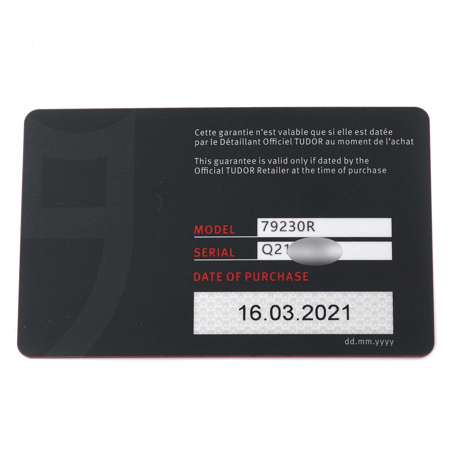 This image shows a warranty card for the Tudor Heritage Black Bay 79230R Men's Stainless Steel Black Dial 79230R Men's Stainless Steel Black Dial model 79230R, detailing the serial number and purchase date.
