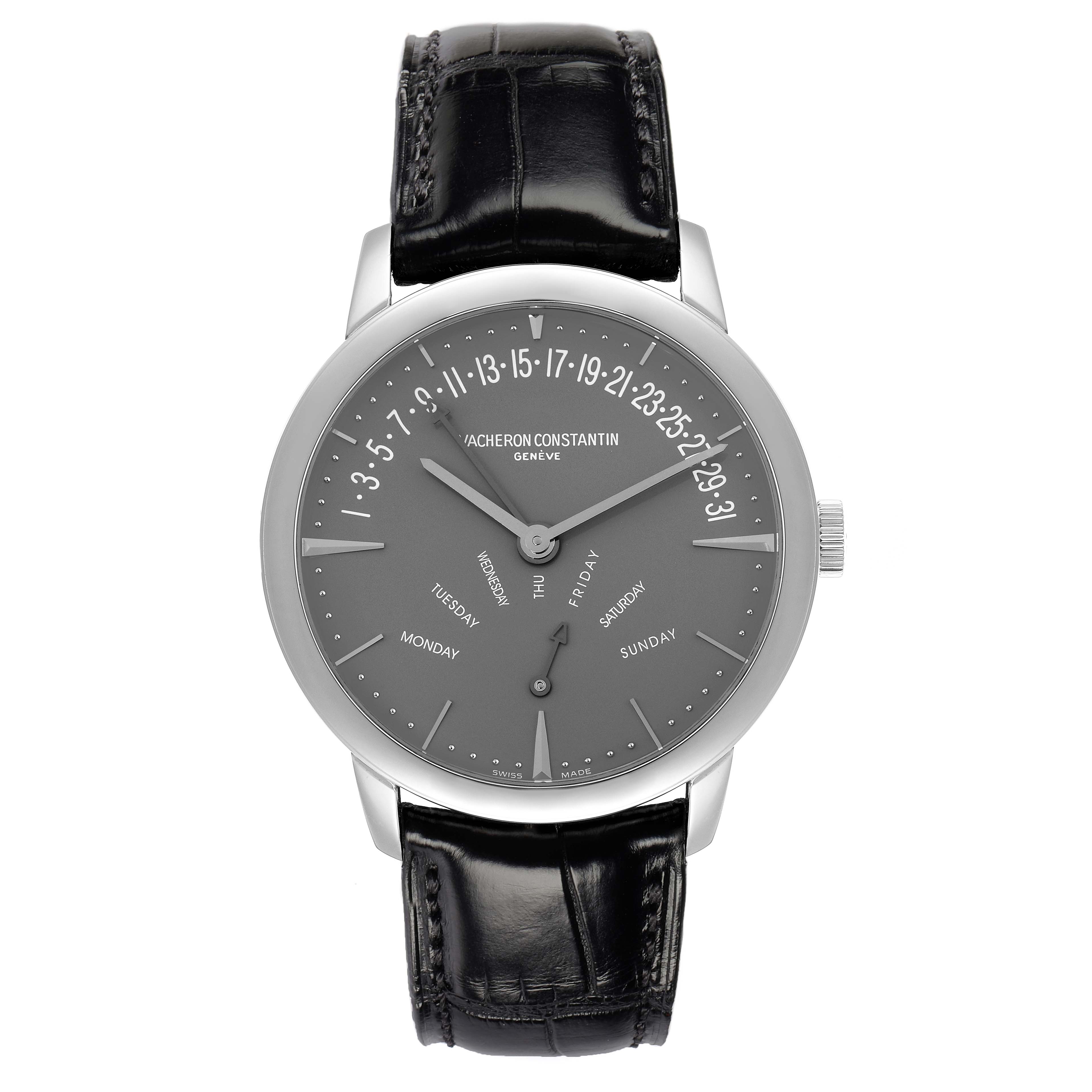 The Vacheron Constantin Patrimony 86020 Men
s Platinum Grey Dial watch is shown from a front angle, featuring a gray dial with day and date indicators, silver hands, and a black leather strap.